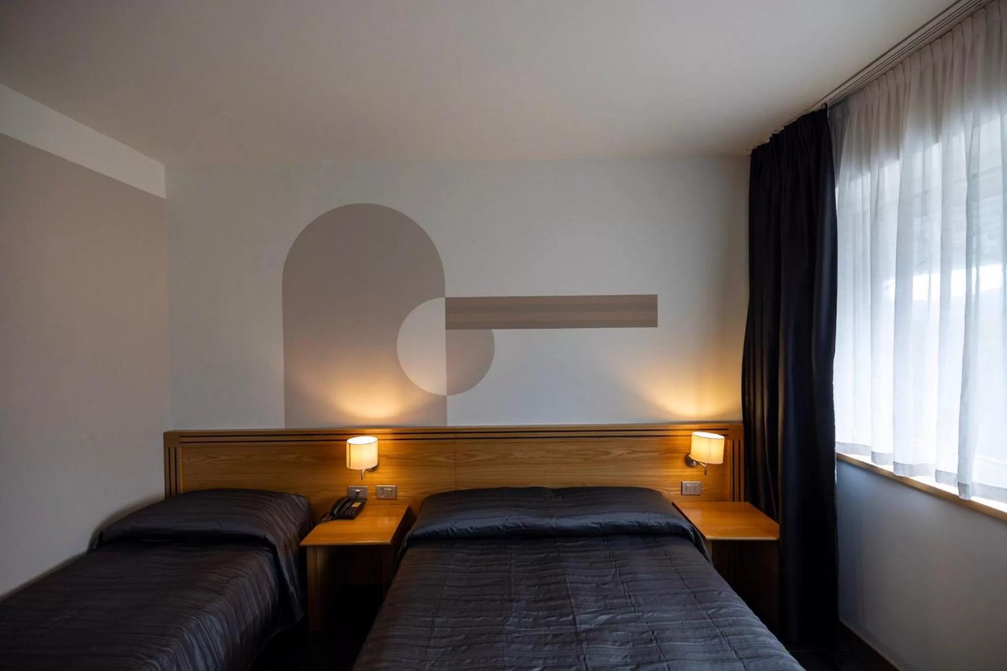 Photo of the whole room, Bed in Hotel Europa Belluno