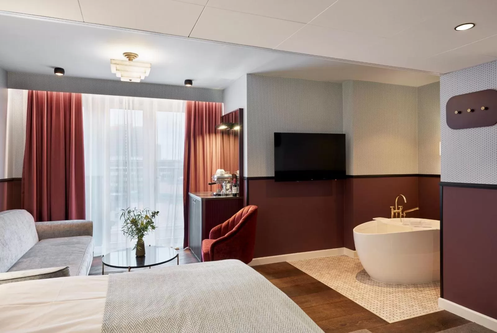 Living room, Bed in WIDE Hotel