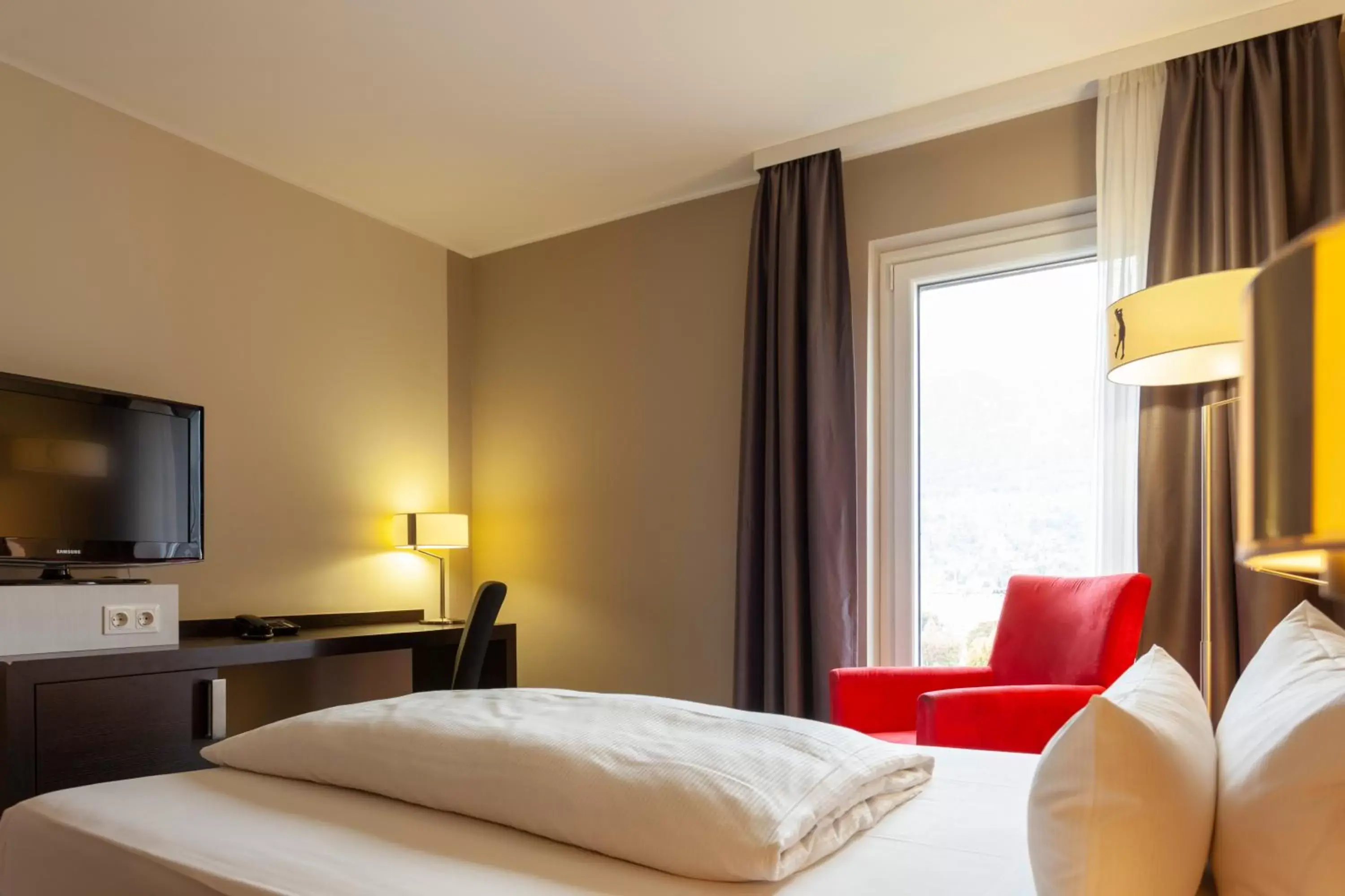TV and multimedia, Bed in Tivoli Hotel Innsbruck
