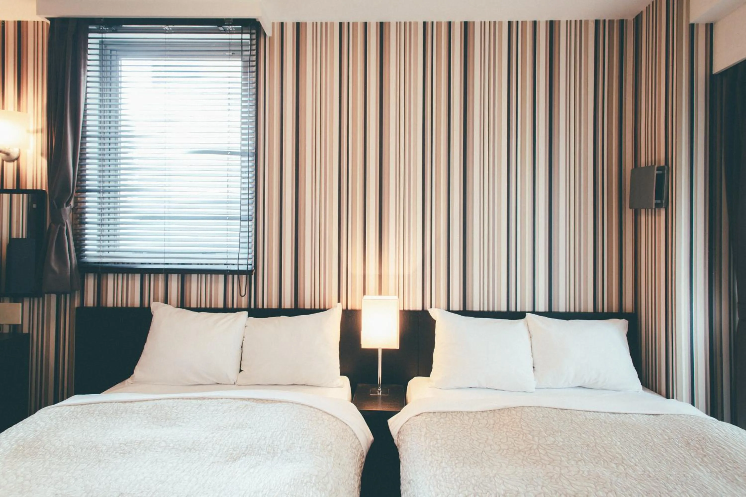 Bed in Kuretake Inn Premium Hamamatsucho