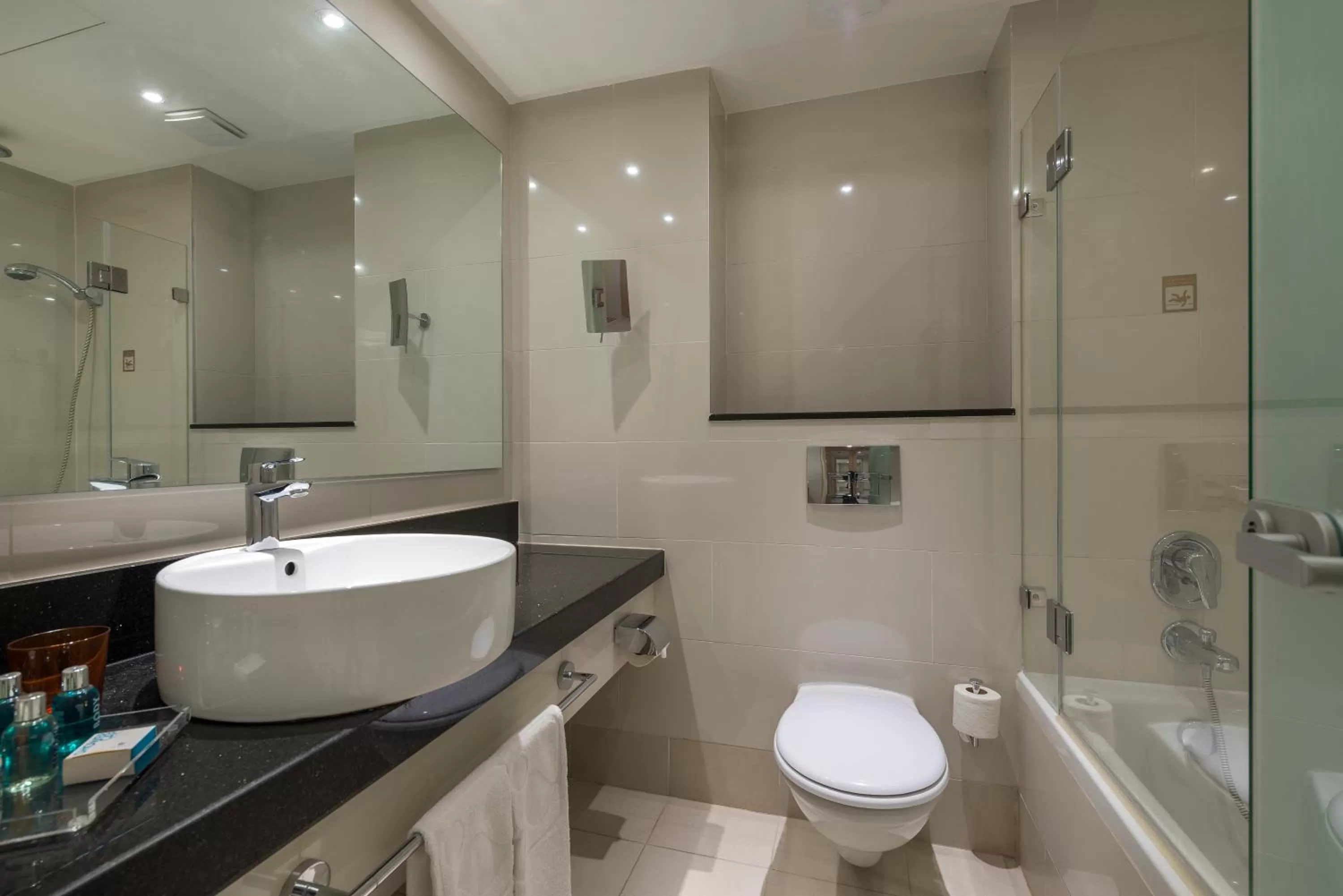 Bathroom in Yam Suf by Isrotel Collection