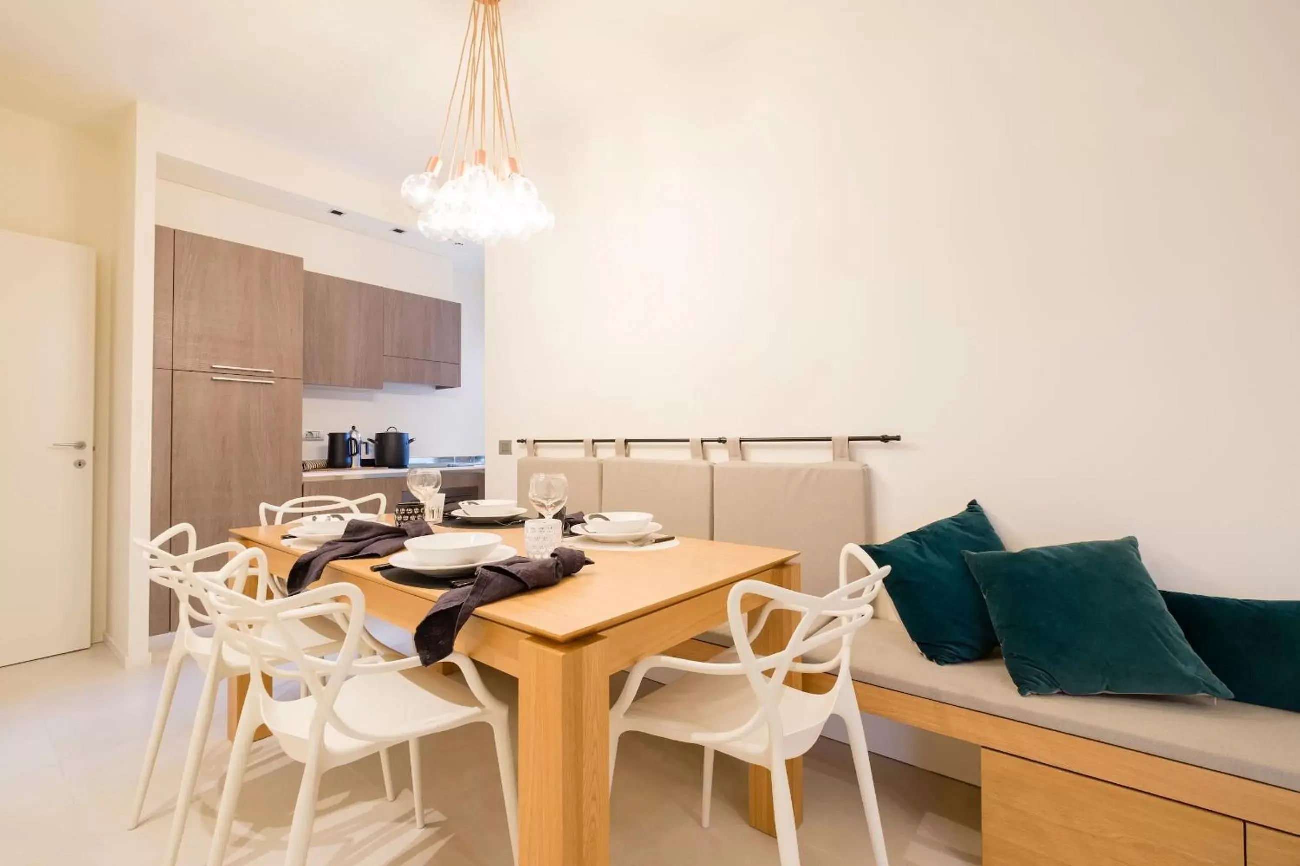 Living room, Dining Area in Metropol Ceccarini Suite