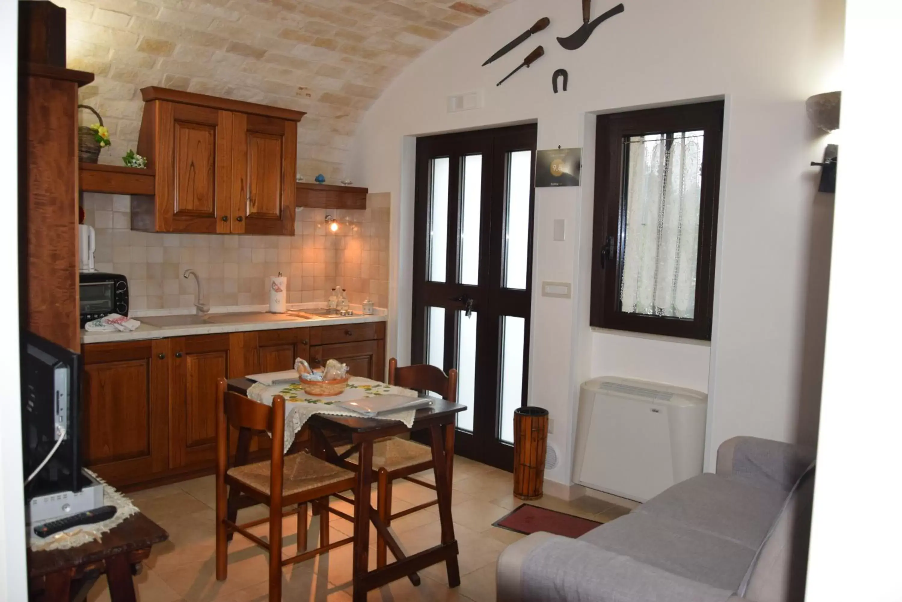 Kitchen or kitchenette, Dining Area in Quei Trulli Divini