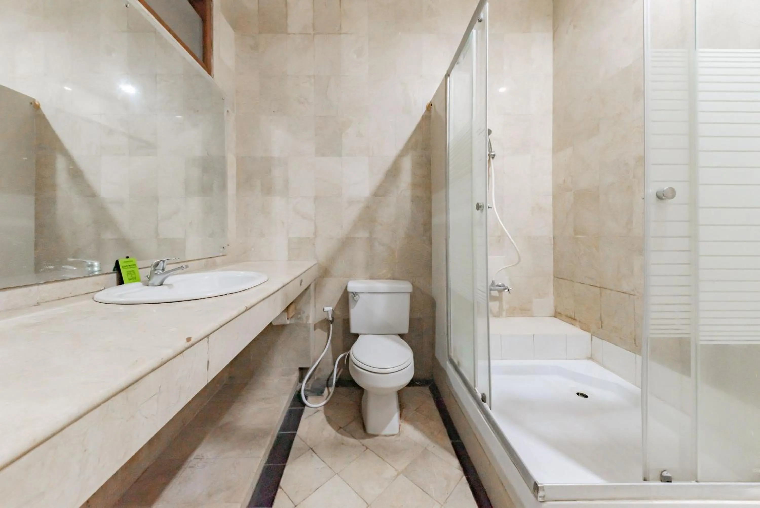Bathroom in Urbanview De Ethnic Hotel Bandung by RedDoorz