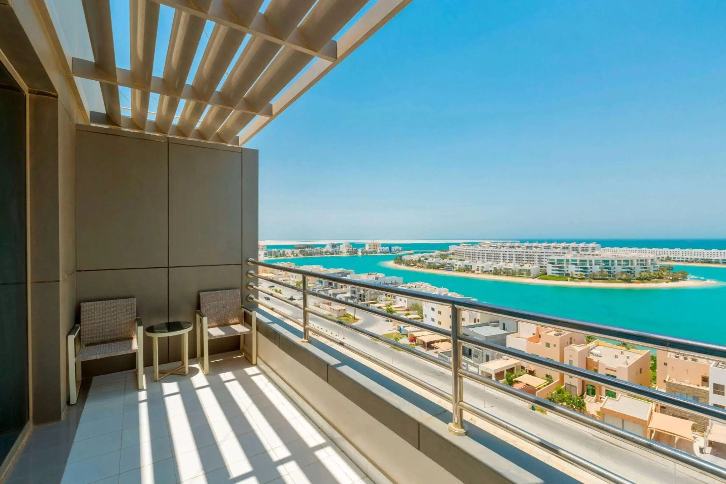 Bed, Balcony/Terrace in Ramada Hotel and Suites Amwaj Islands