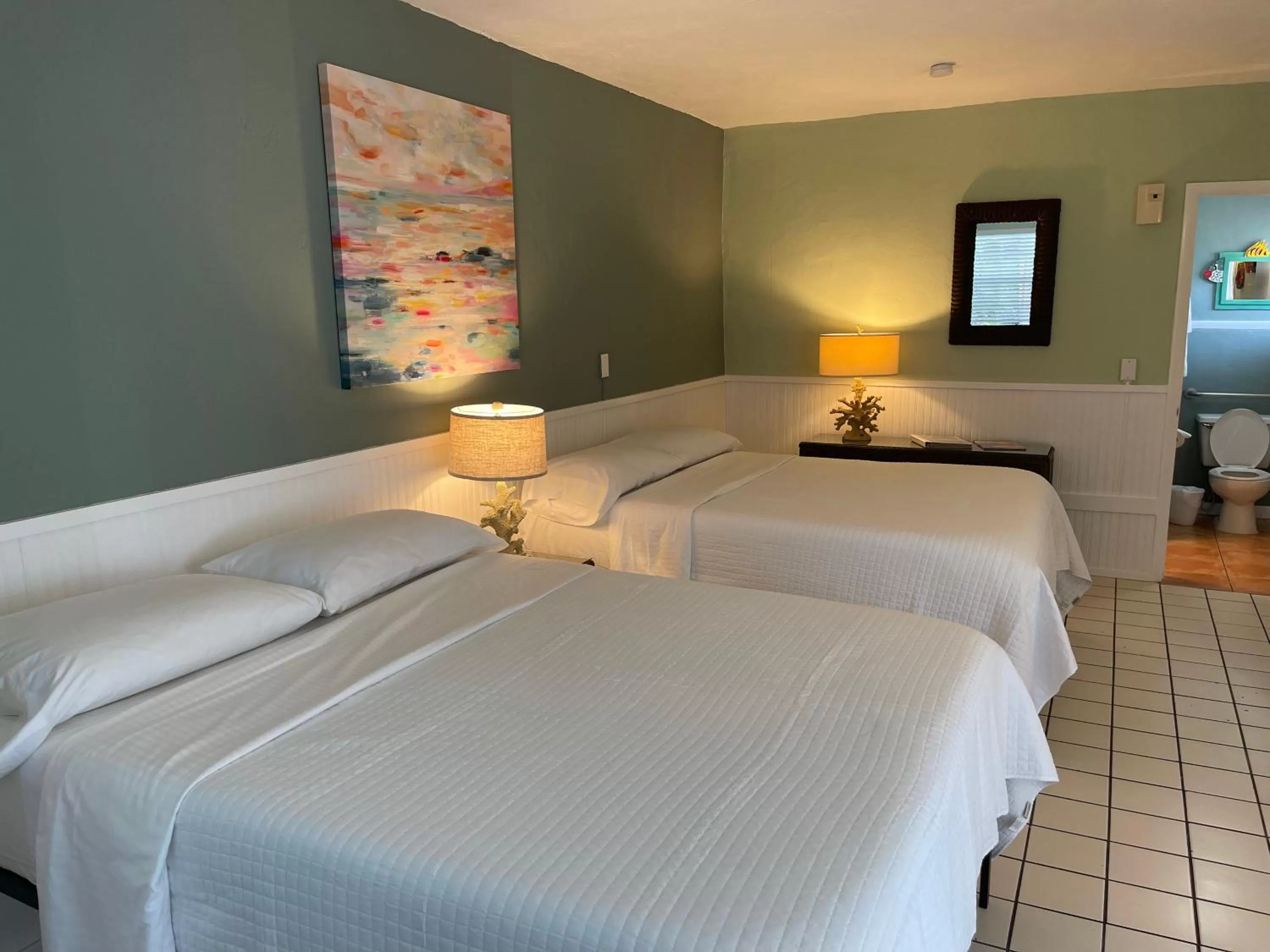 Bed in Breezy Palms Resort