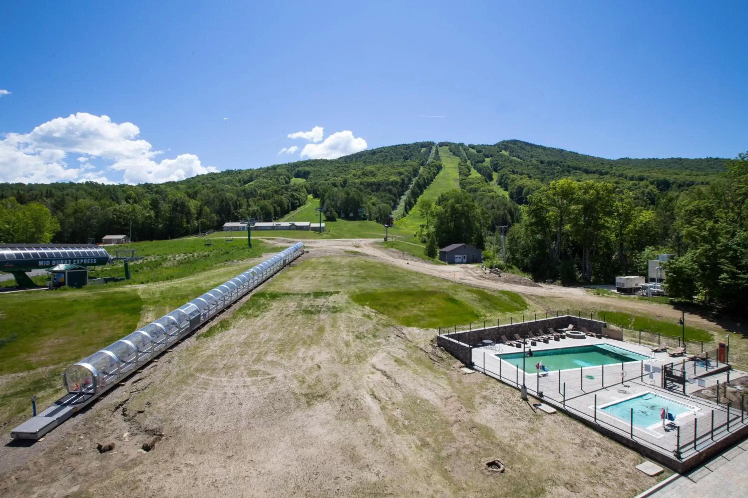 Patio, Pool View in Burke Mountain Hotel and Conference Center