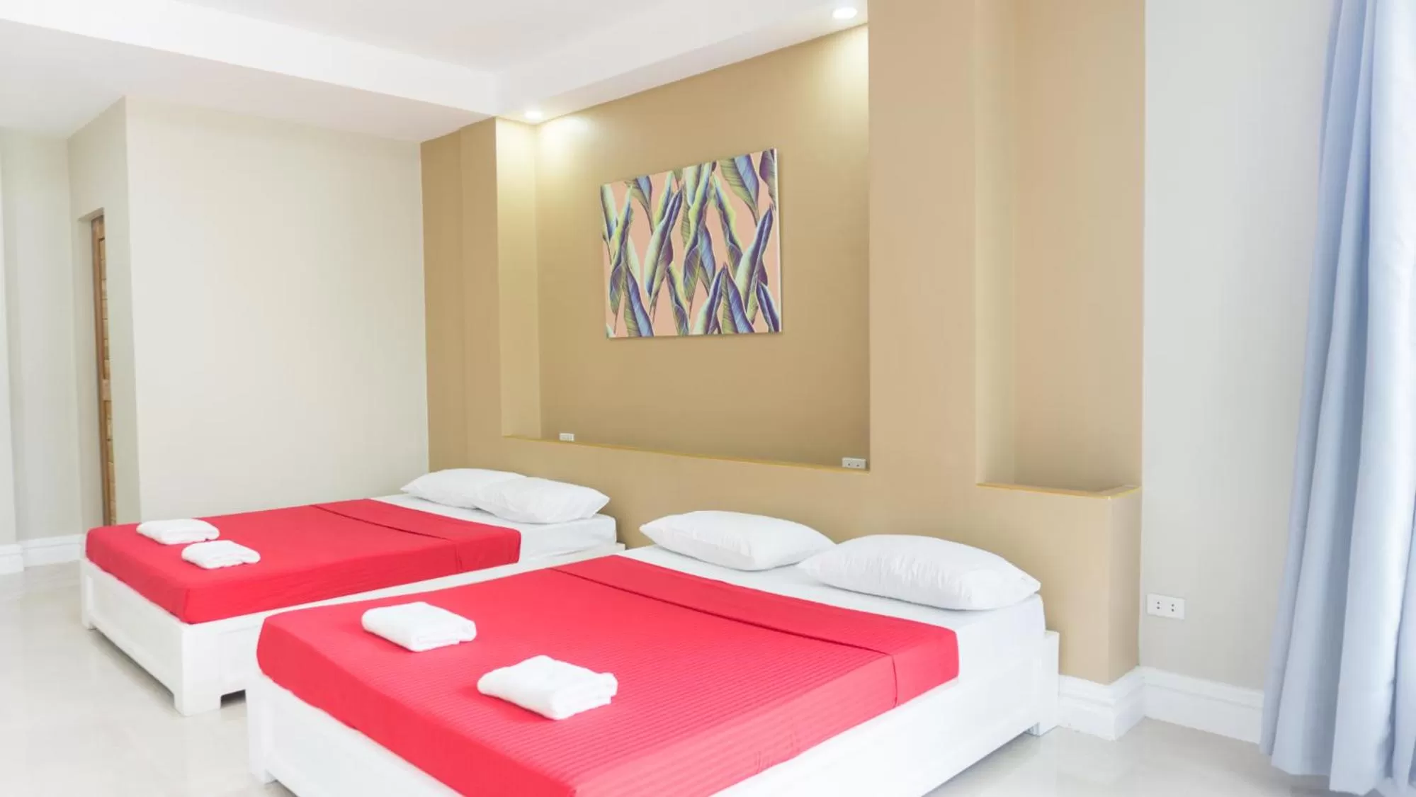 Bed in Sandscape Hotel