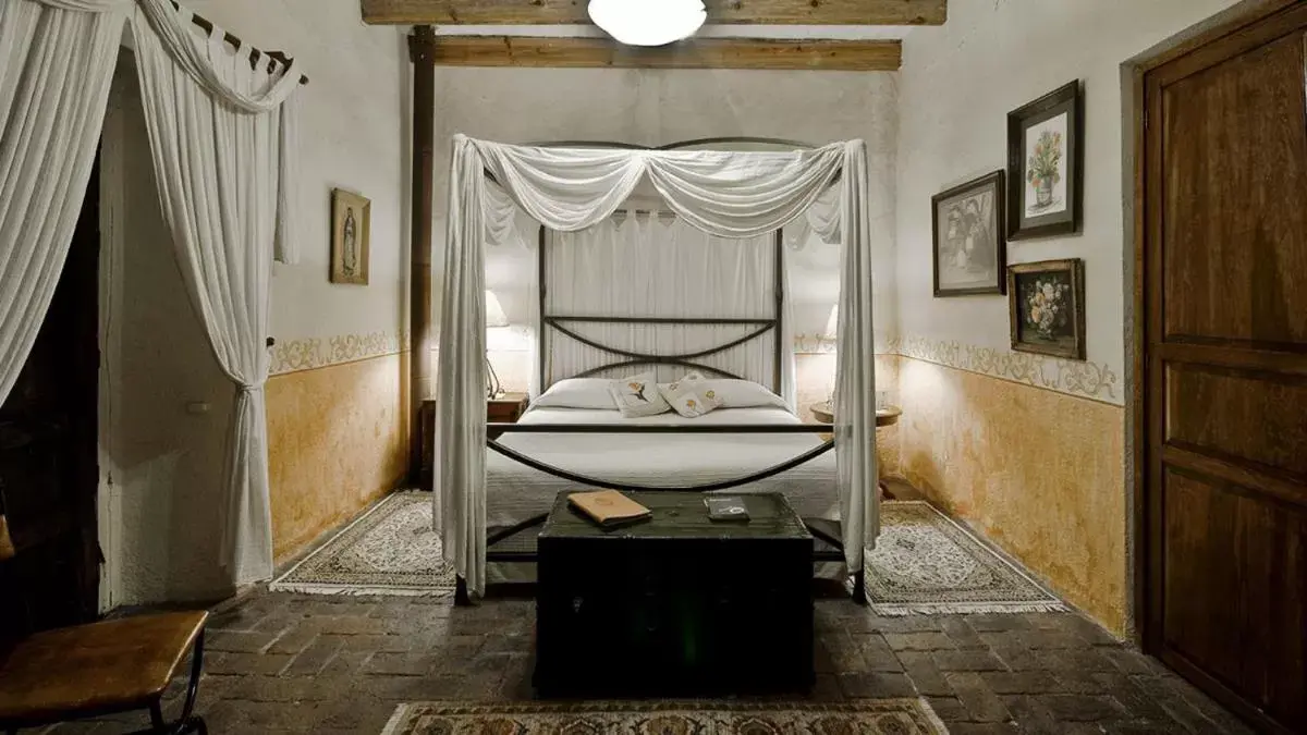 Bed in Hacienda Sepulveda Hotel & Spa