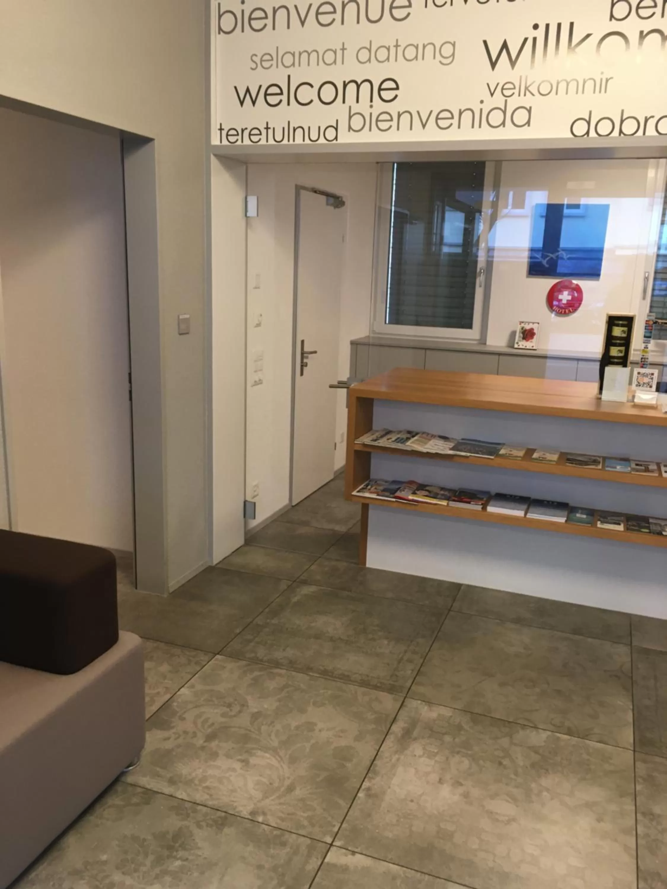 Communal lounge/ TV room in Hotel Flawil