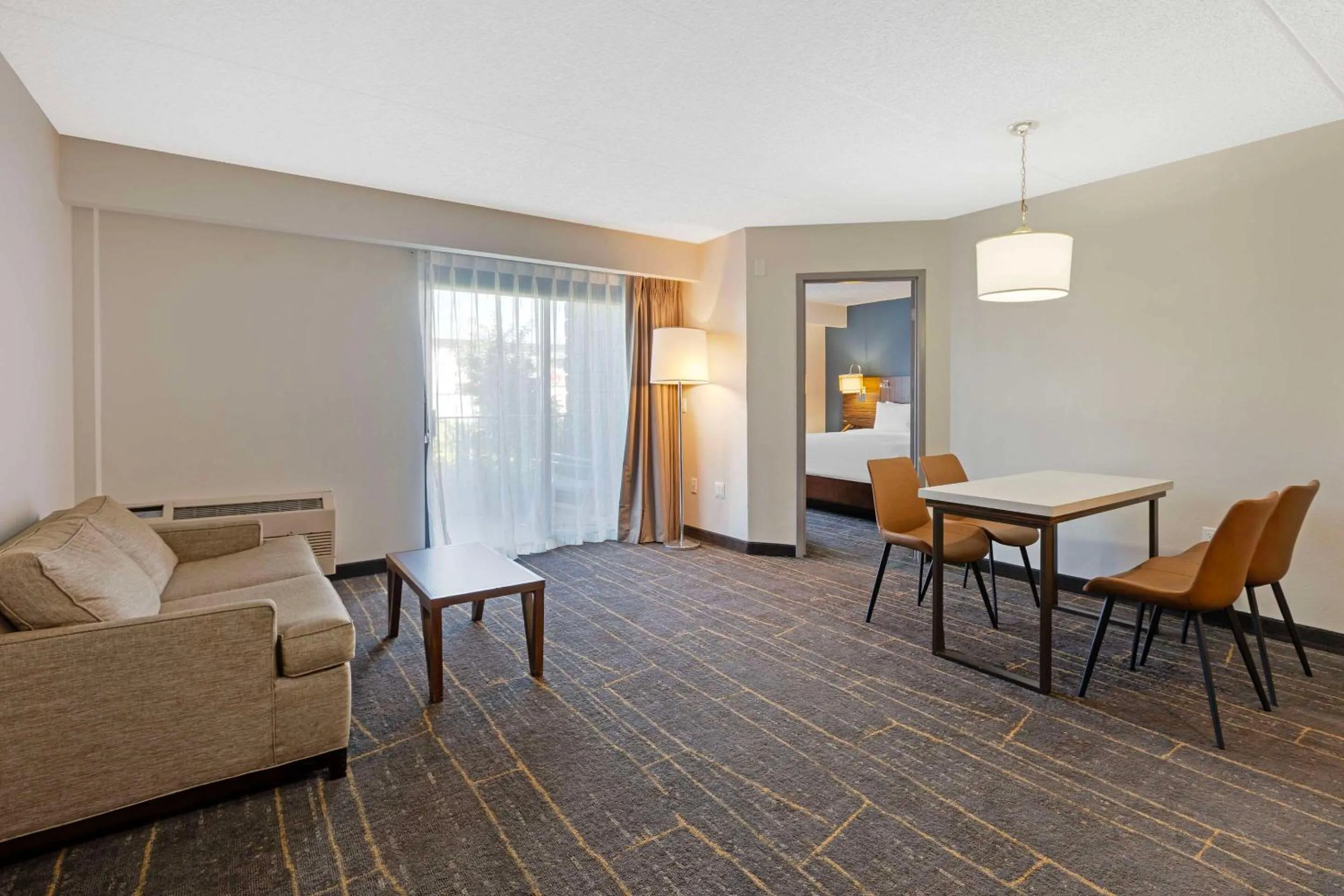 Bedroom, Seating Area in Quality Inn near Finger Lakes and Seneca Falls