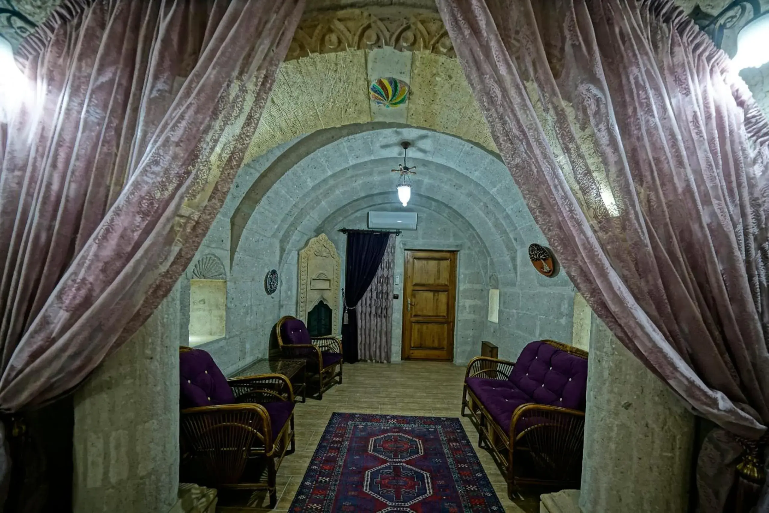 Seating area in Holiday Cave Hotel