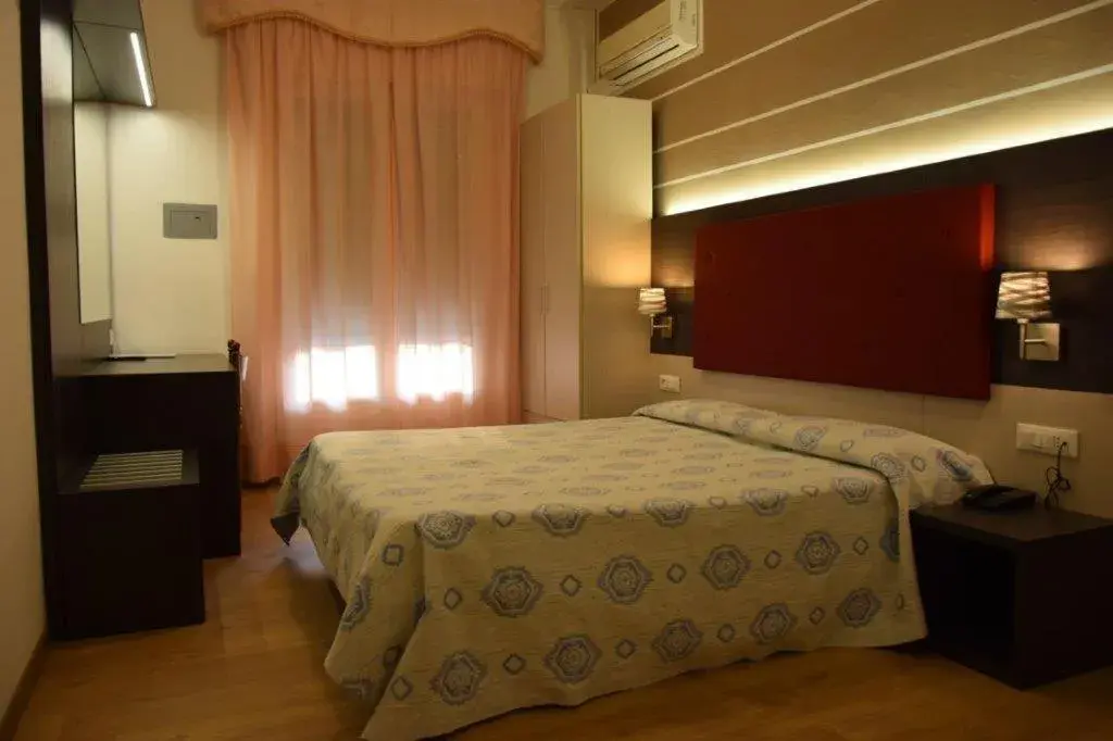 Bed in Hotel Verdi