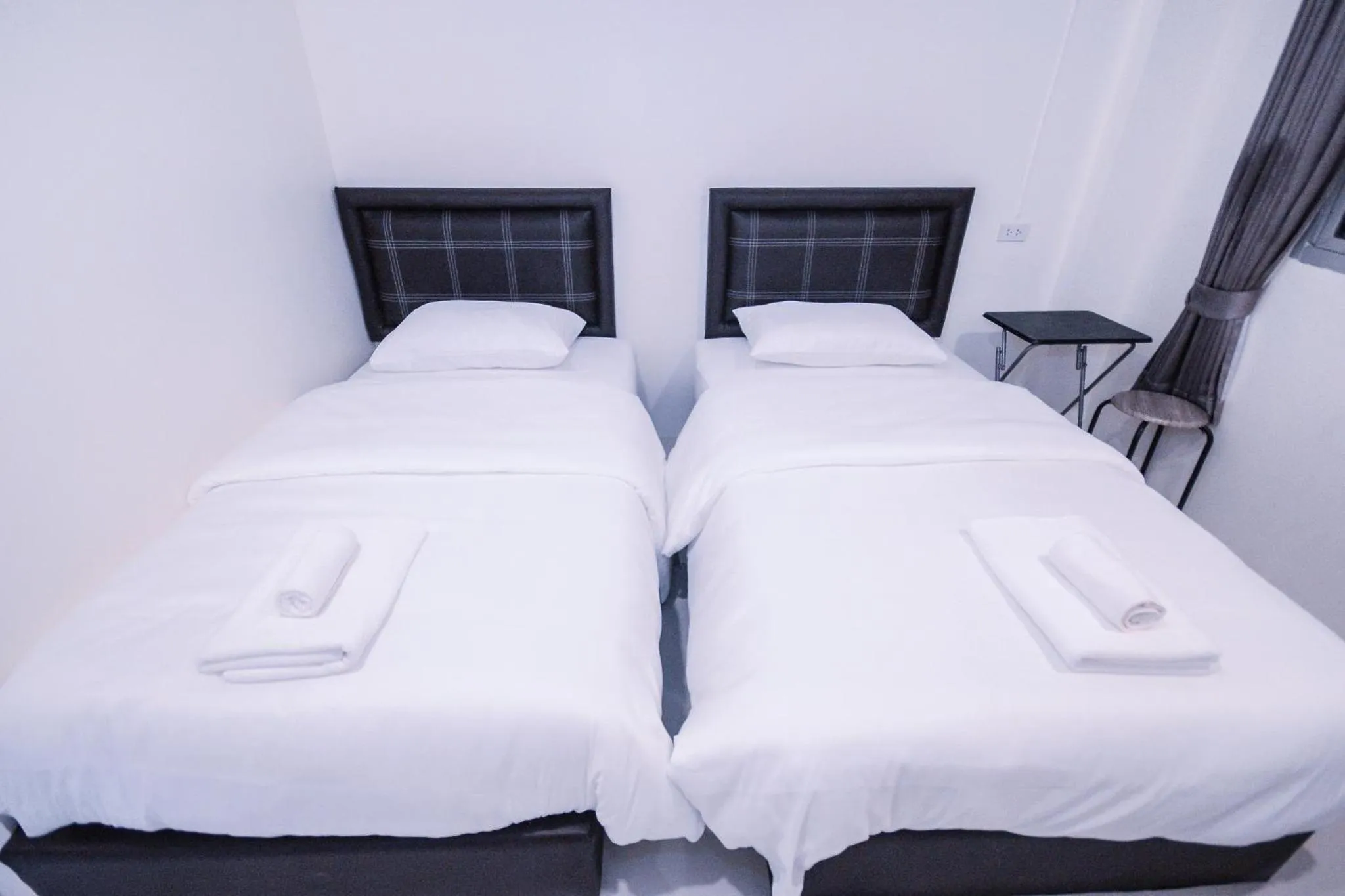 Bed in U-need Guesthouse95