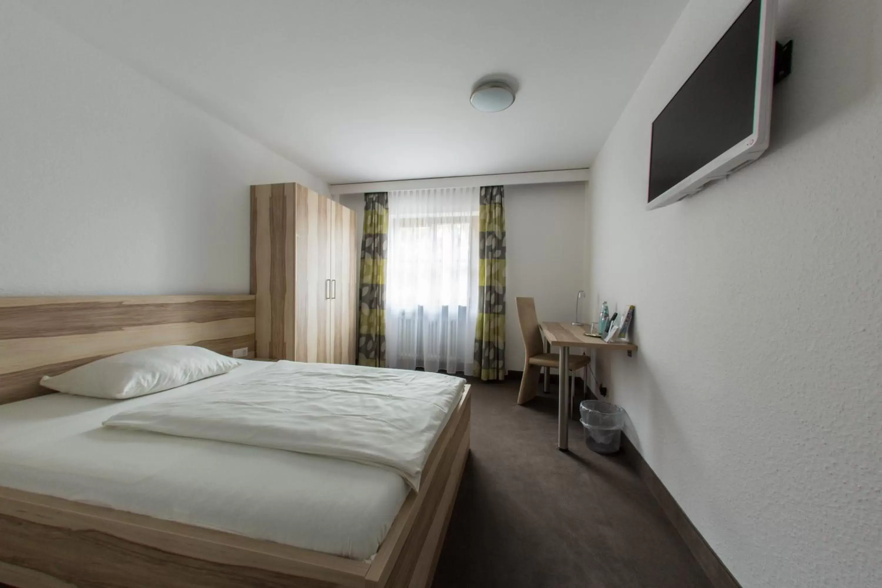 Photo of the whole room, Bed in Hotel Stadt Tuttlingen