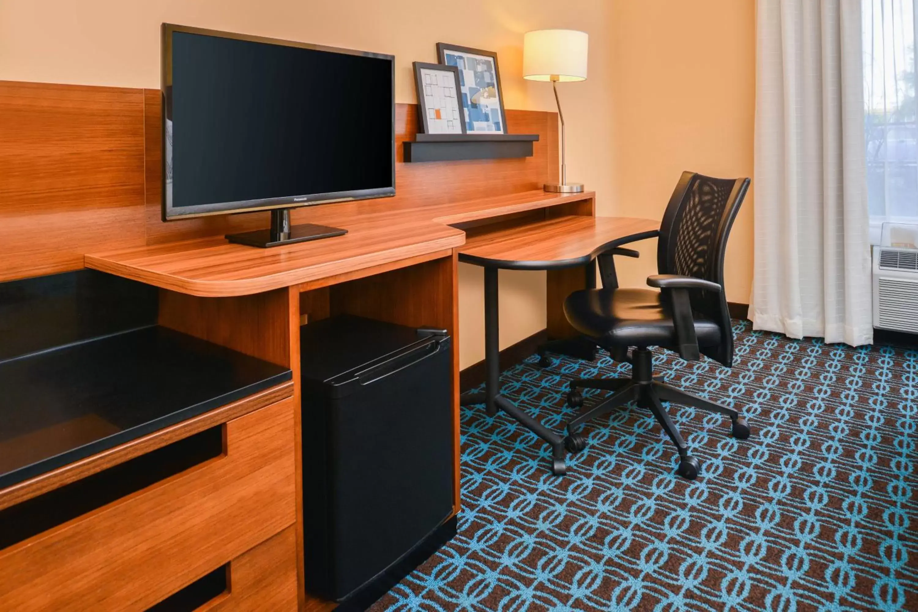 Photo of the whole room, TV/Entertainment Center in Fairfield Inn & Suites Beaumont