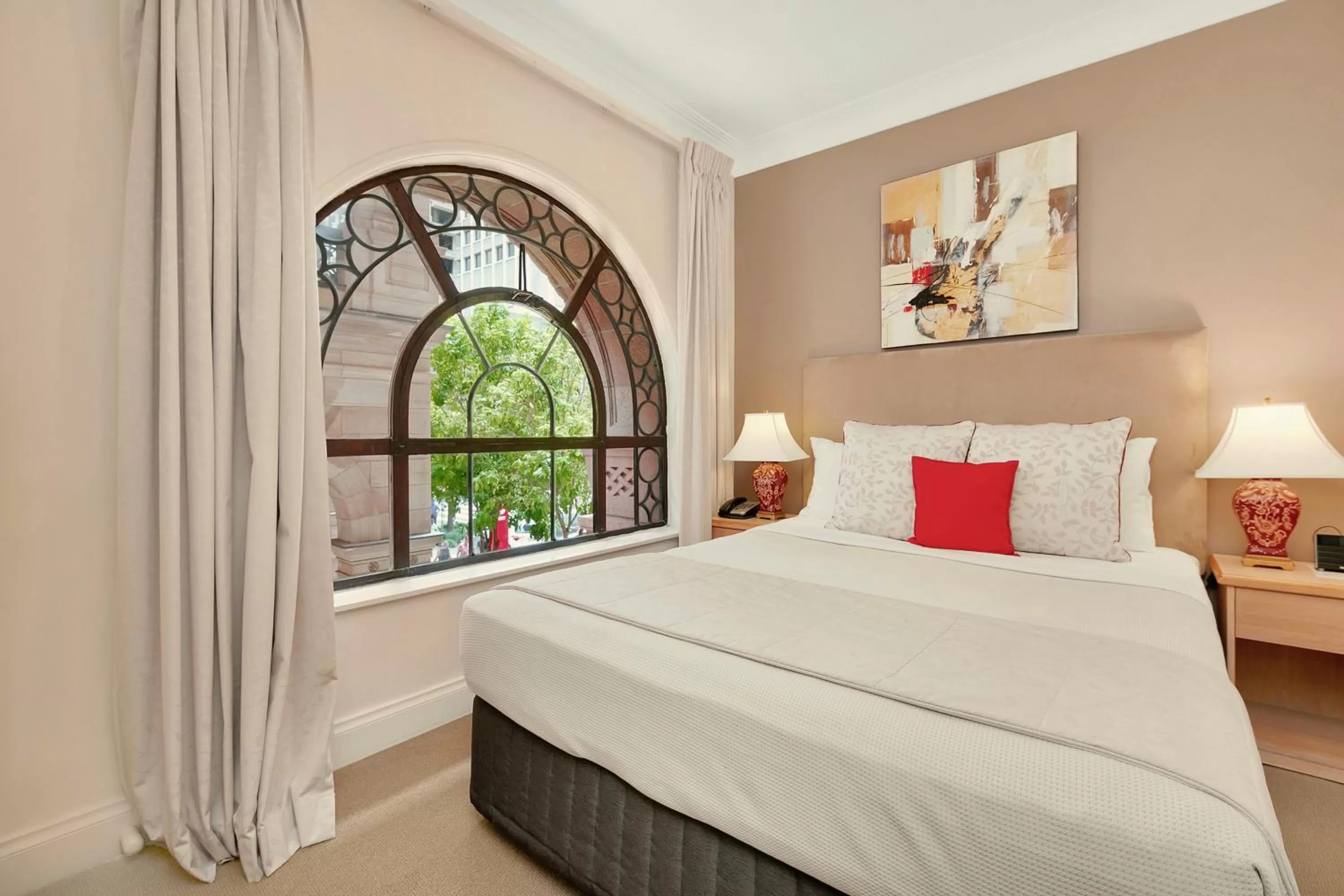 Bed in Manor Apartment Hotel