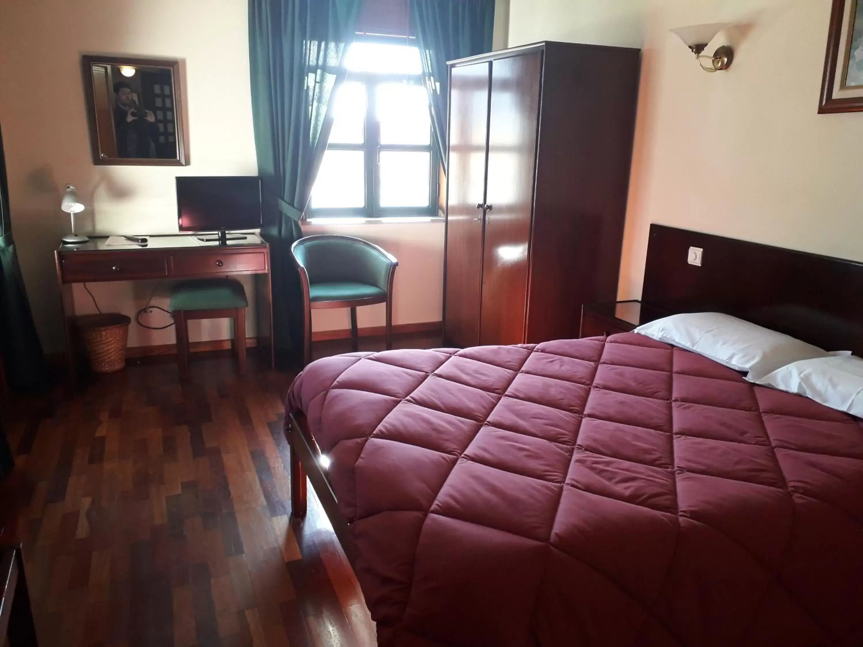 Bed in Hotel Trindade Coelho