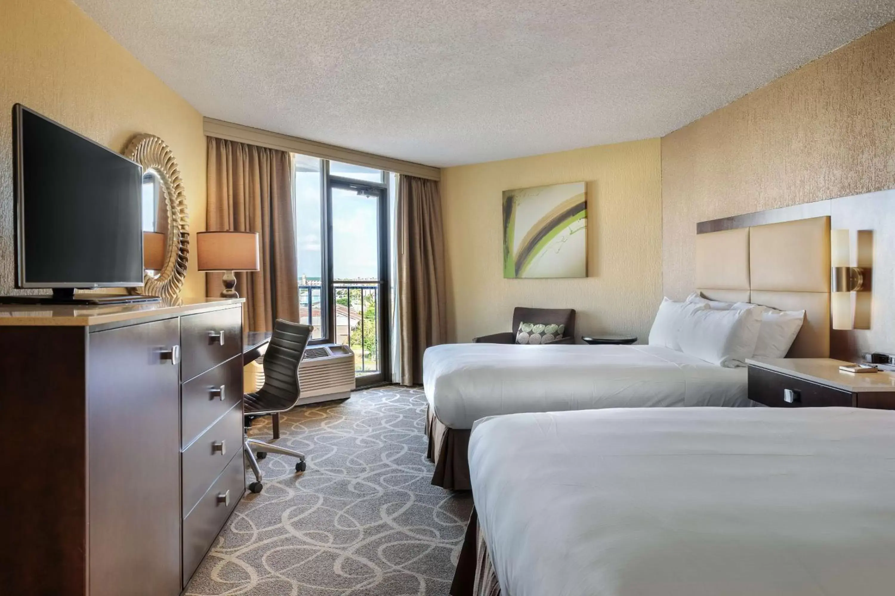 Bed, TV/Entertainment Center in Hilton Galveston Island Resort