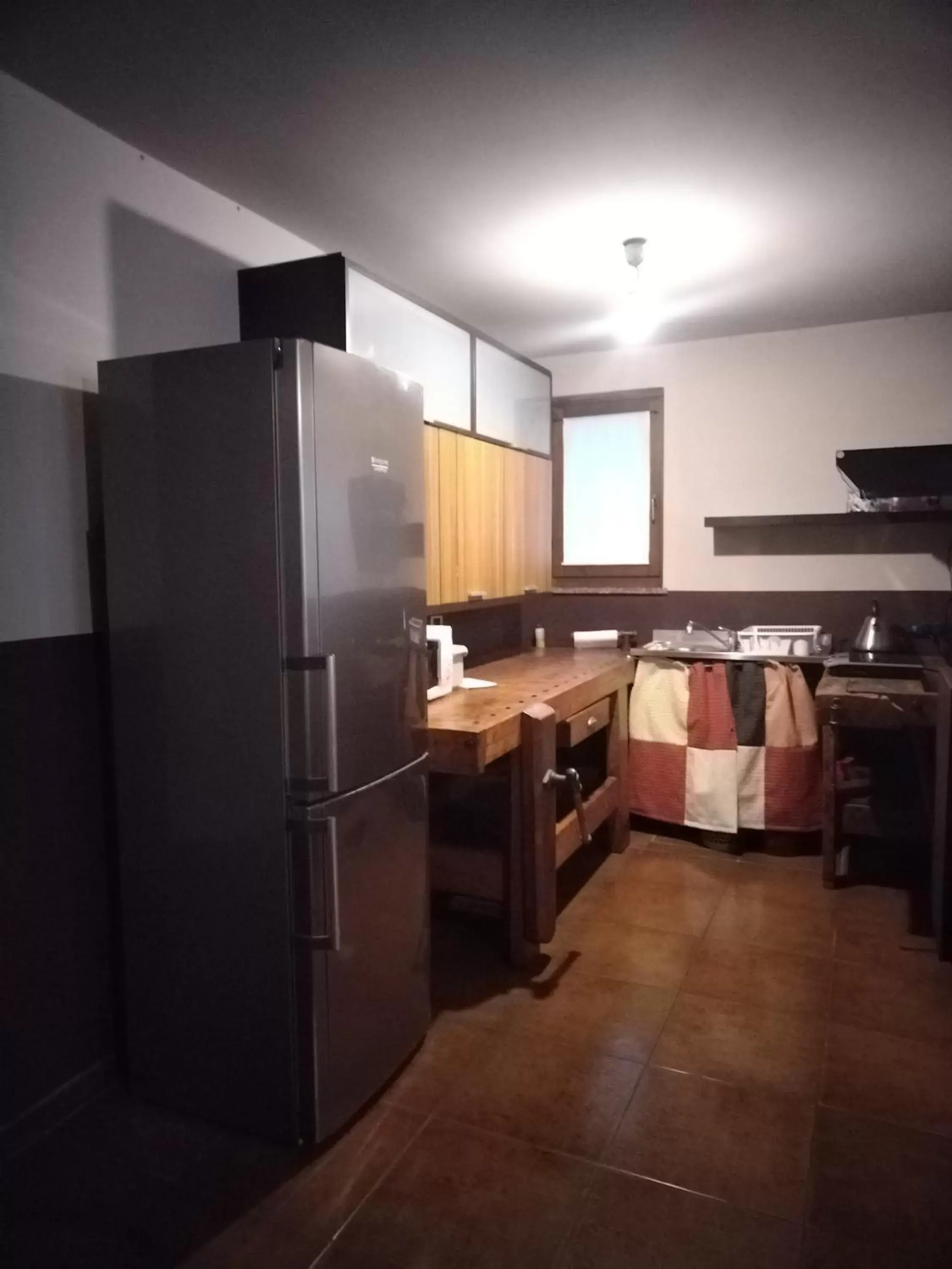 Kitchen/Kitchenette in B&B Via Del Golf 41