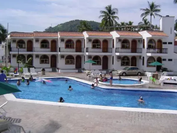 Swimming Pool in Costa Alegre Hotel & Suites