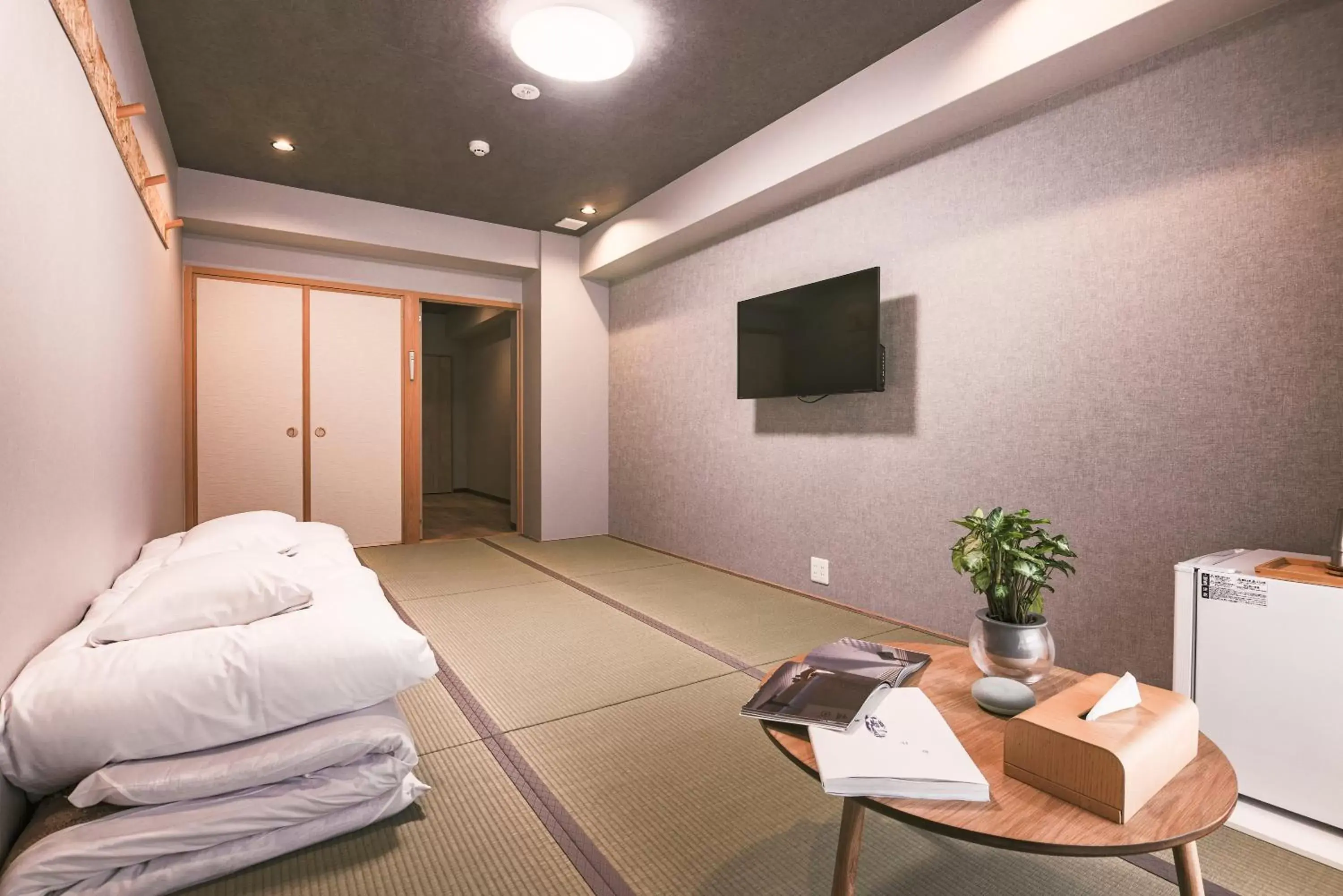 Communal lounge/ TV room, Bed in WAYFARER Kyoto Shijo Communal lounge/ TV room, Bed in WAYFARER Kyoto Shijo