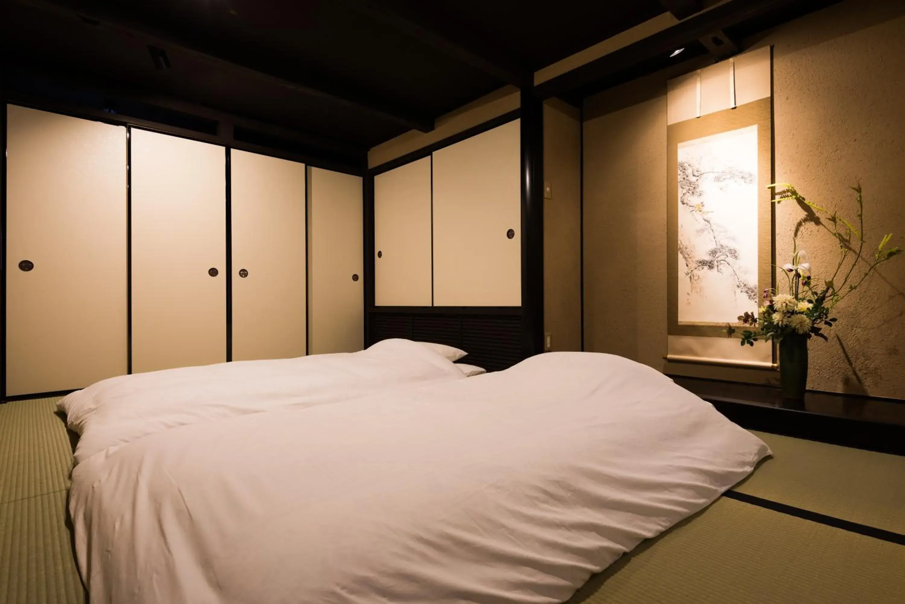 Bed in Kyomachiya Stay Takasegawa Shichijo