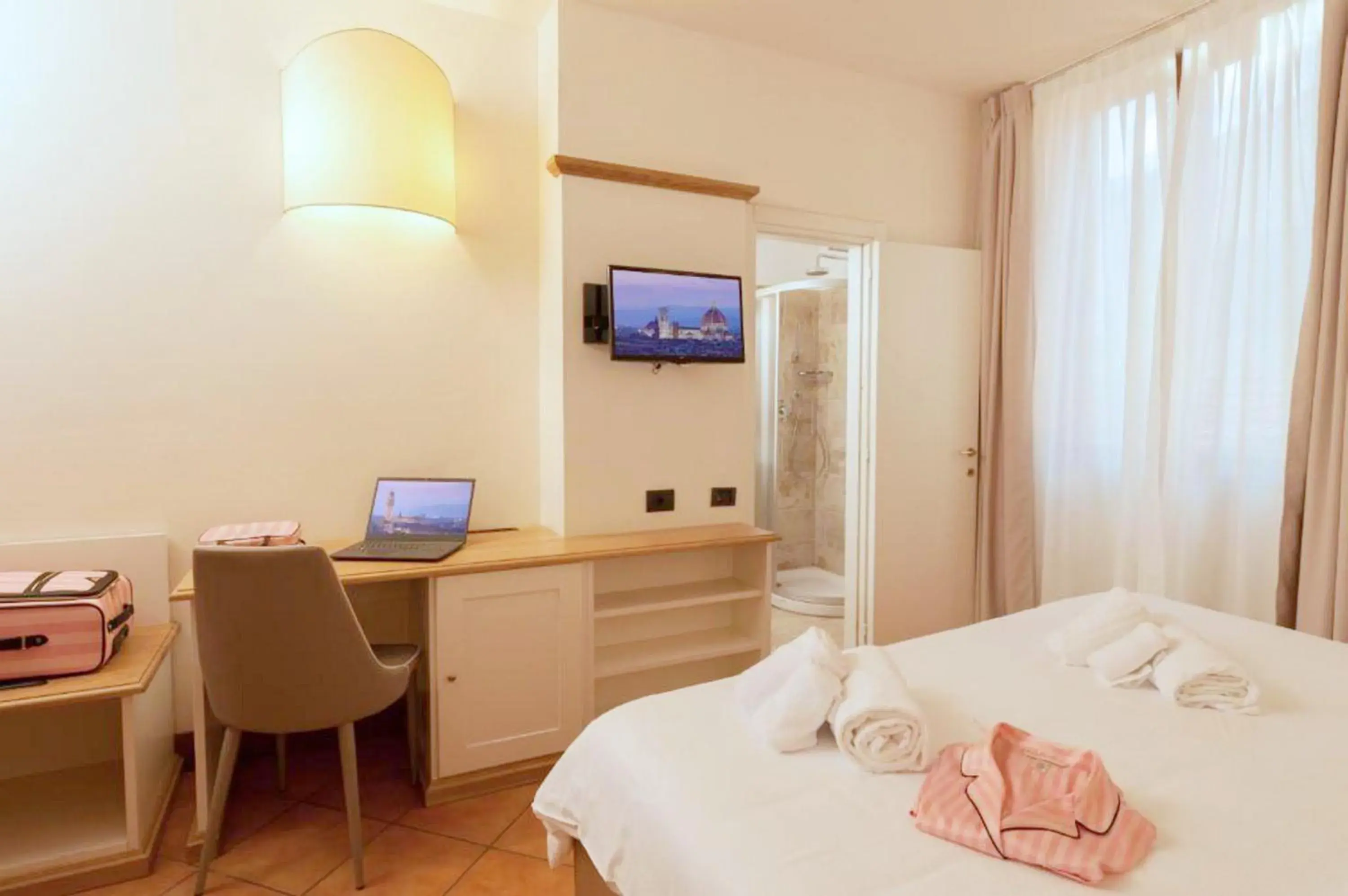 Bed, TV/Entertainment Center in Hotel Relais Il Cestello