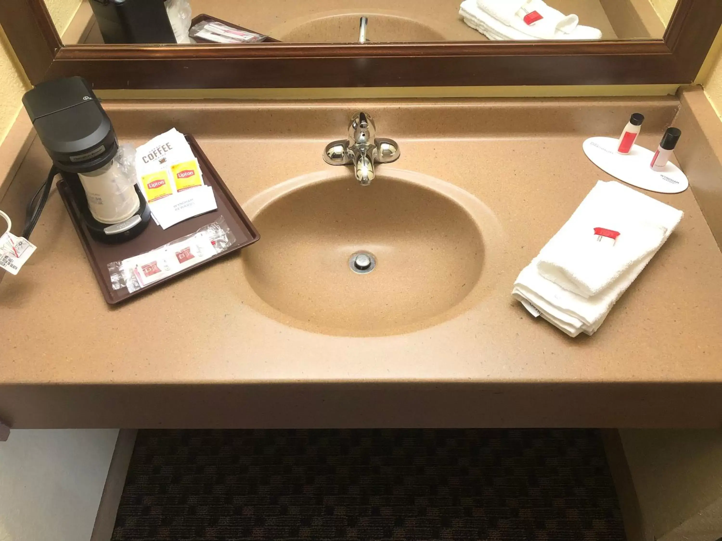 Coffee/tea facilities, Bathroom in Days Inn & Suites by Wyndham Stevens Point