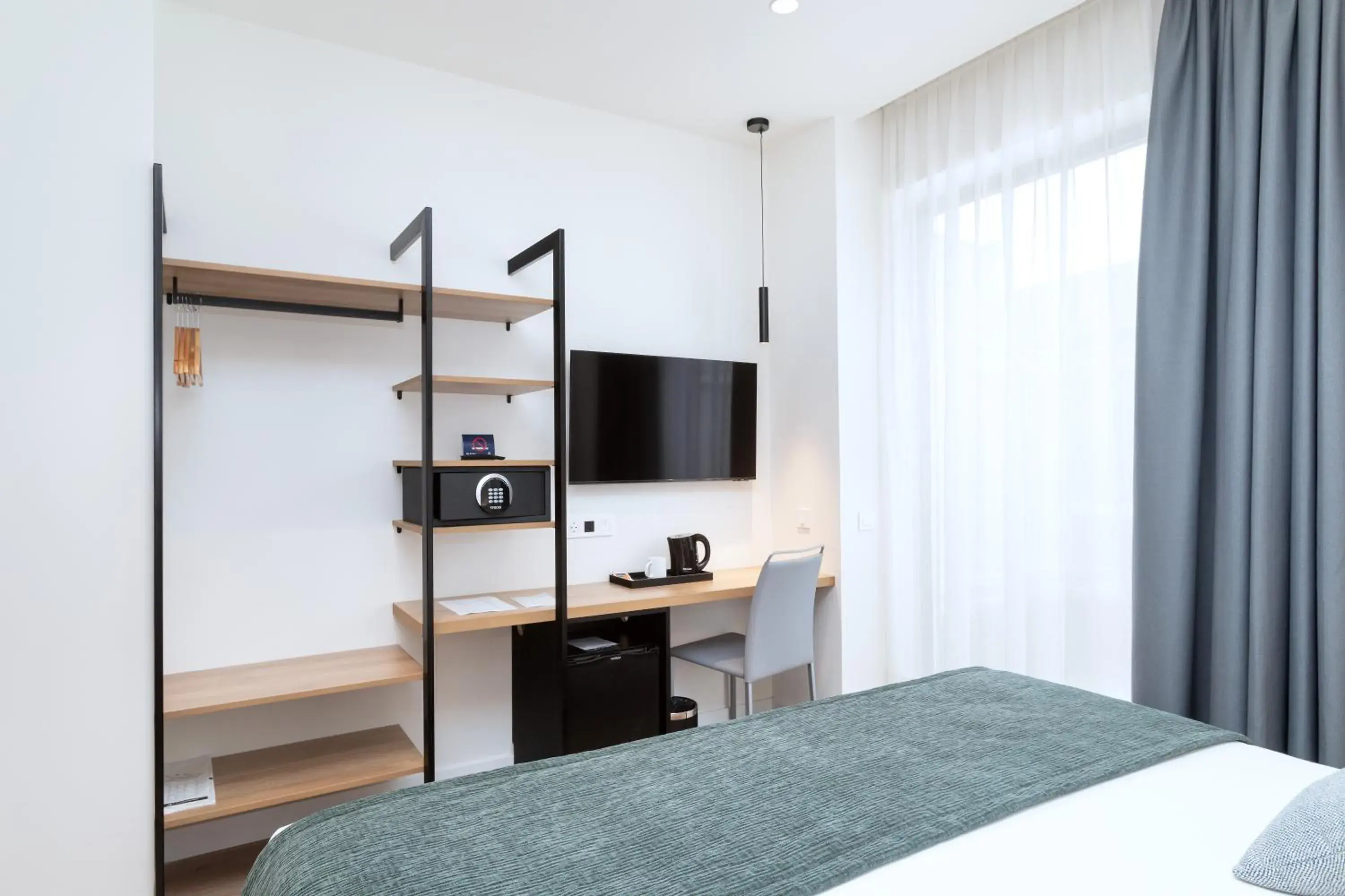 Photo of the whole room, Bed in Alexandre Fira Congress Photo of the whole room, Bed in Alexandre Fira Congress