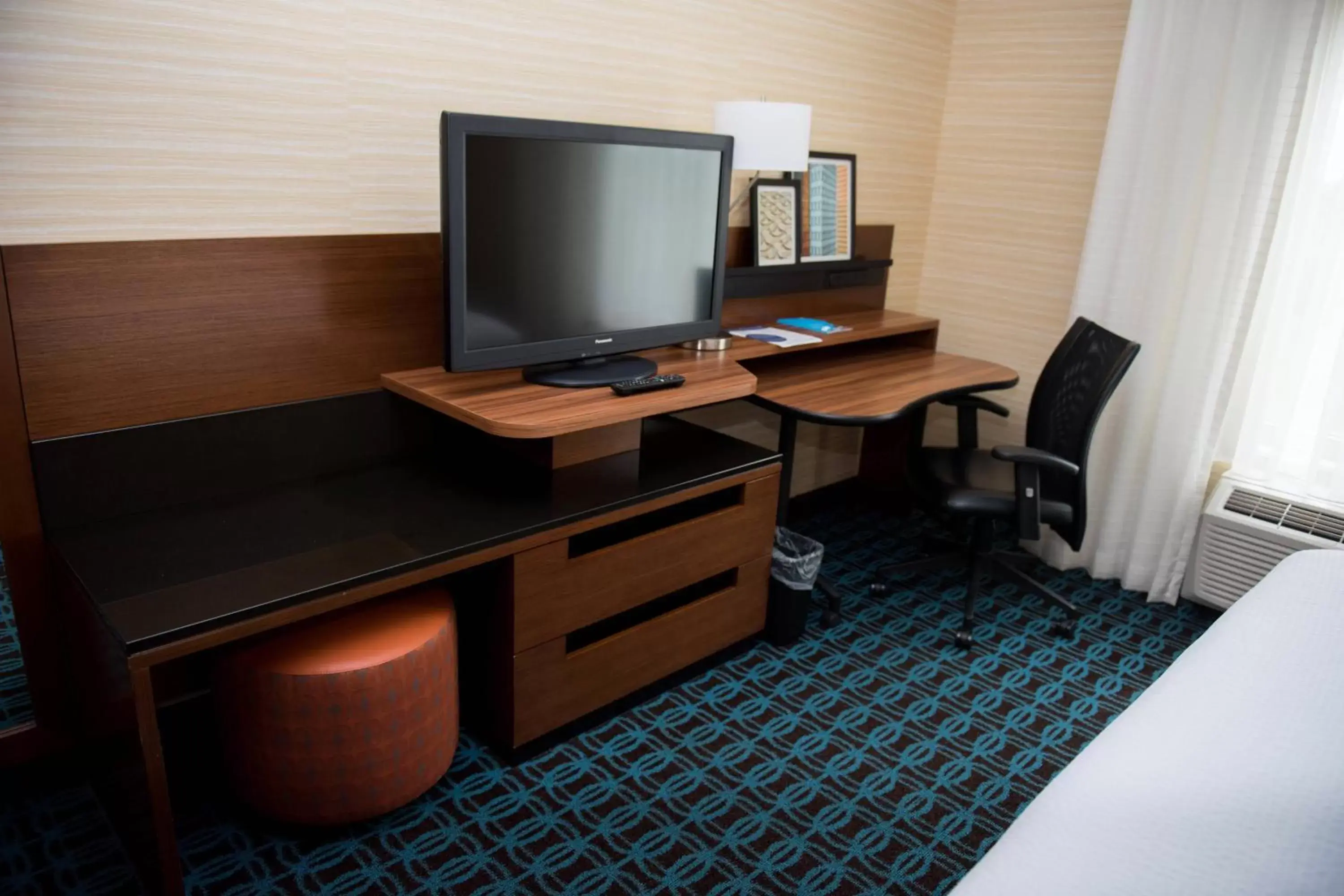 Photo of the whole room, TV/Entertainment Center in Fairfield Inn & Suites by Marriott Moncton