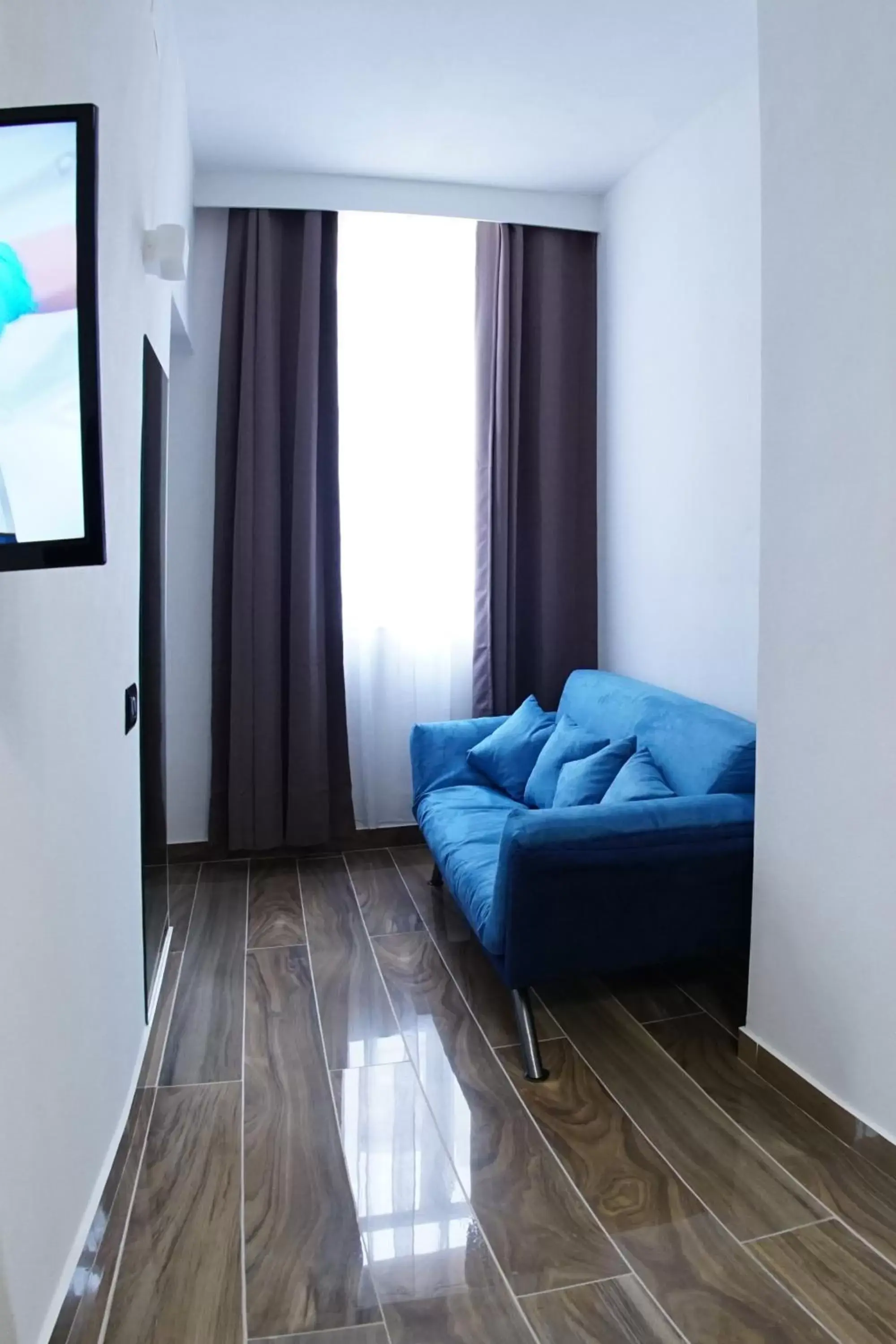 Bedroom, Seating Area in Beverello Suite