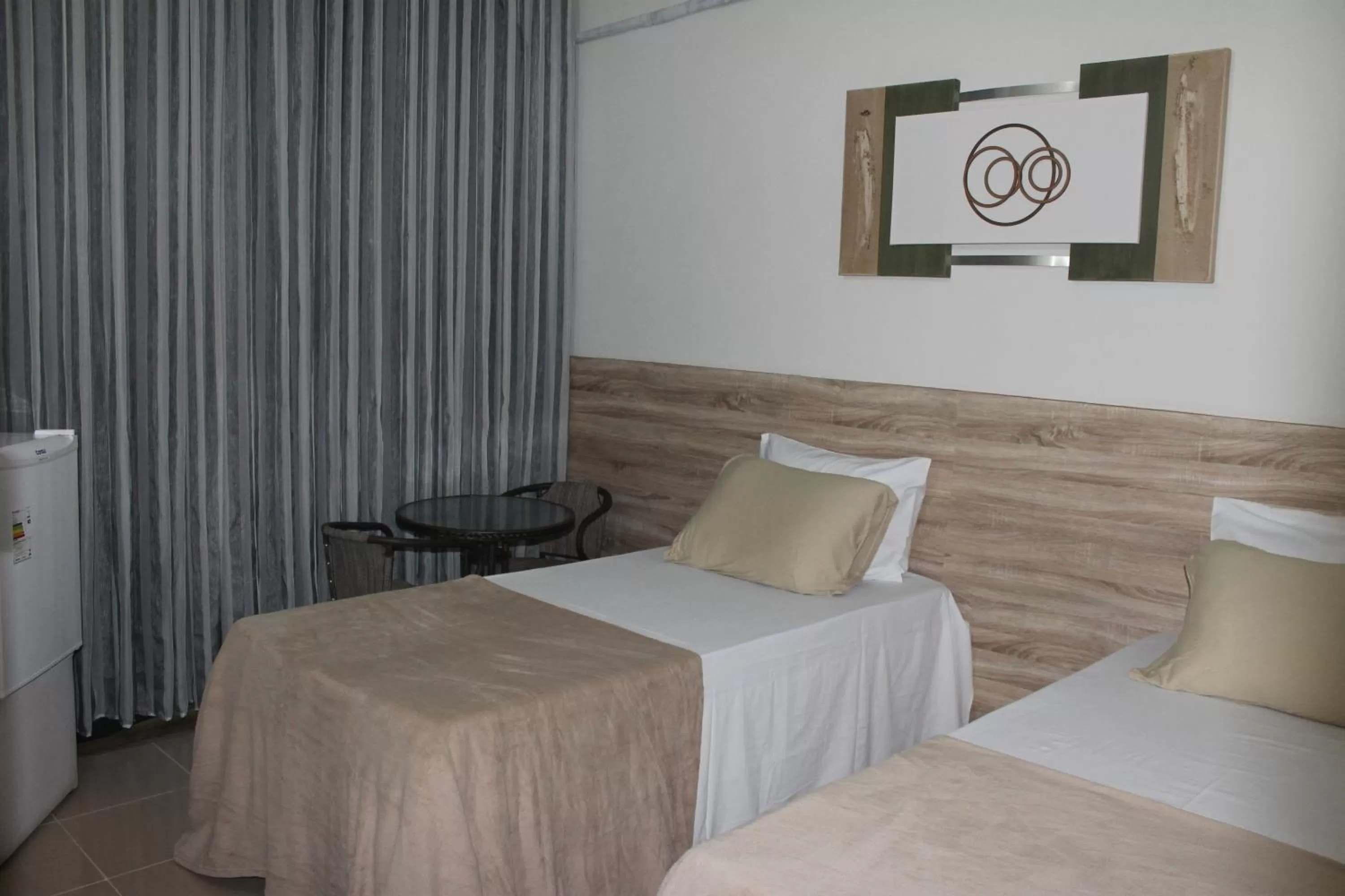 Bed in Pousada Das Palmeiras