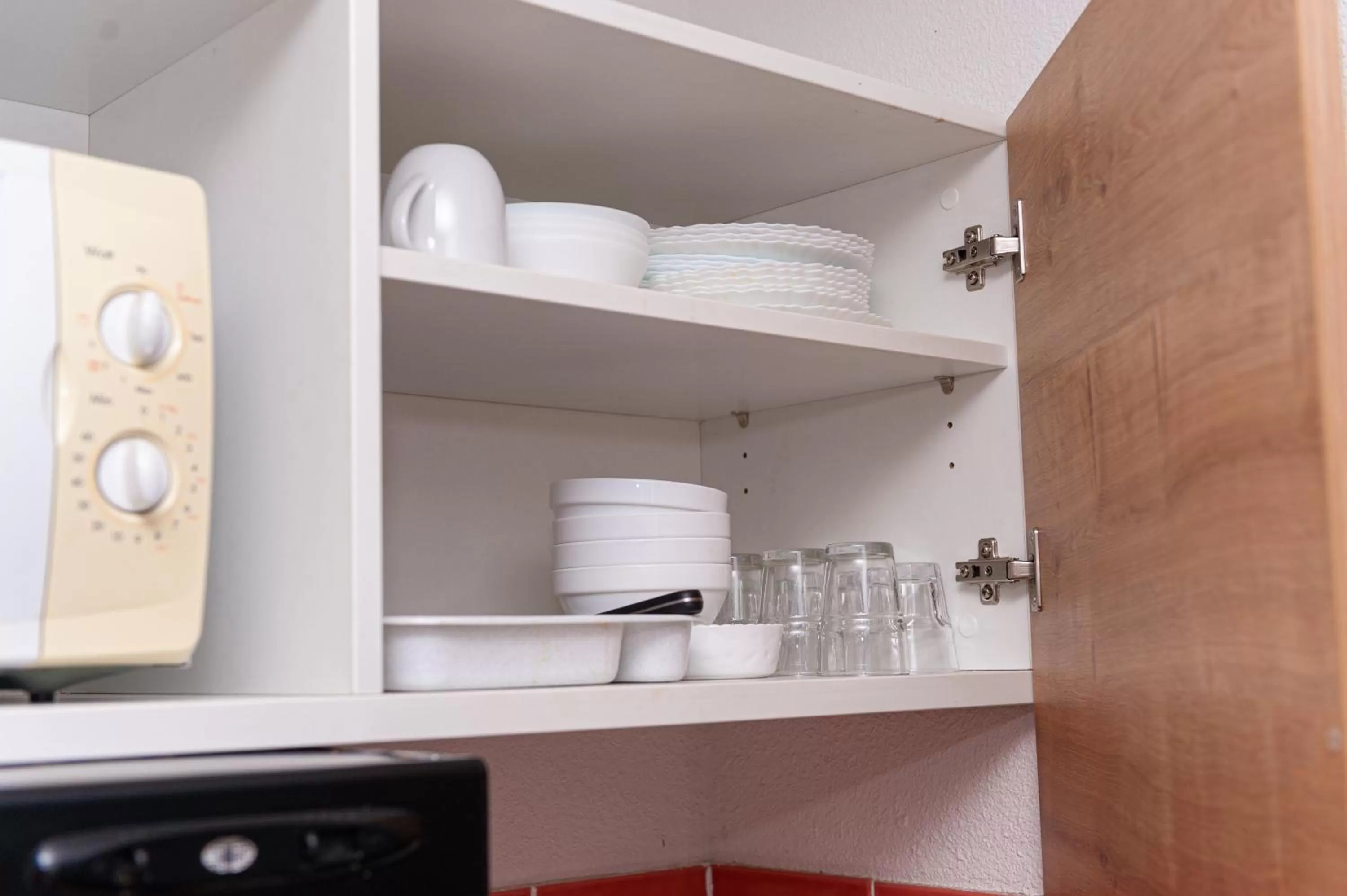 Kitchen or kitchenette in Apparthotel Privilodges Lyon Lumière