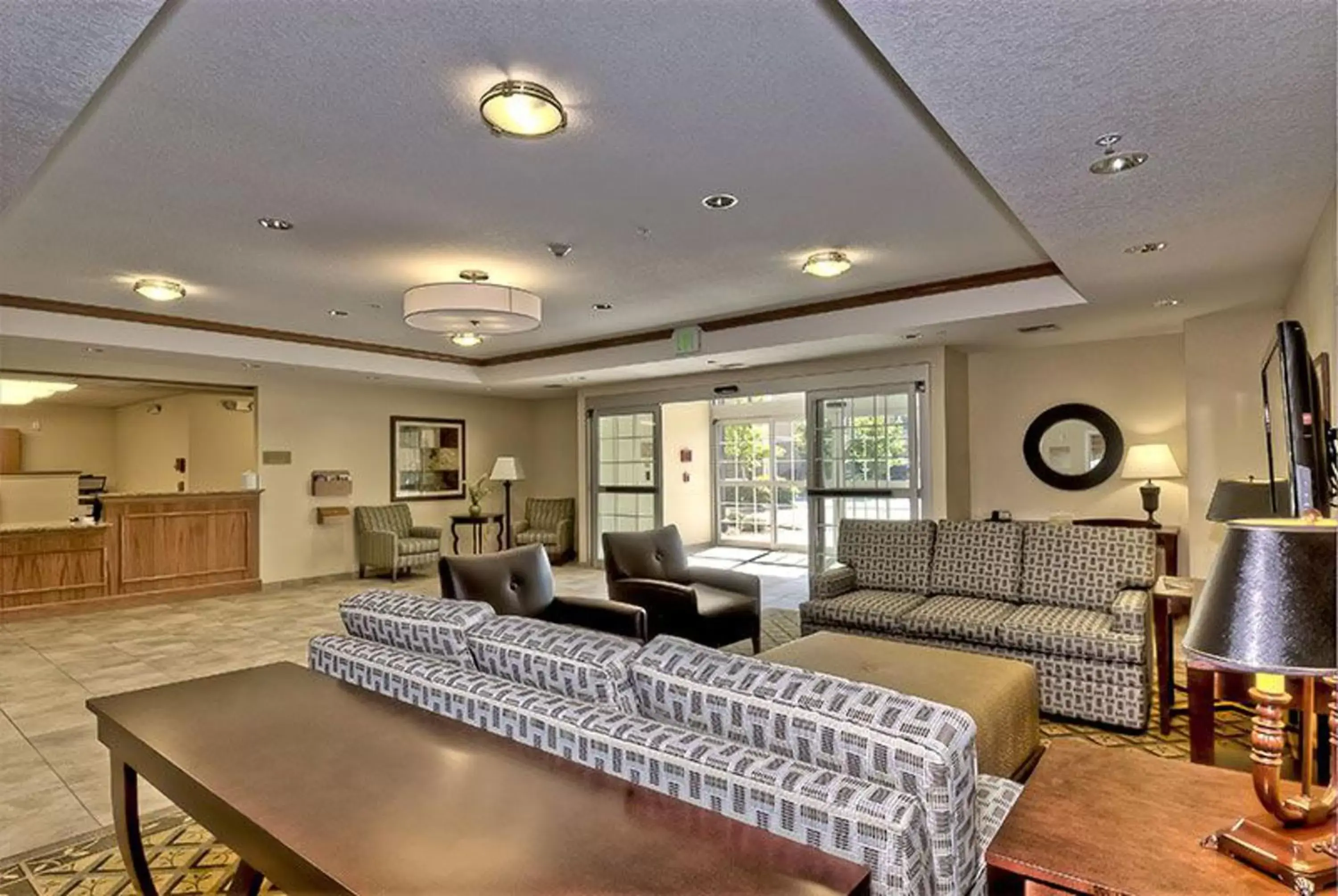 Property building, Seating Area in Candlewood Suites Burlington, an IHG Hotel