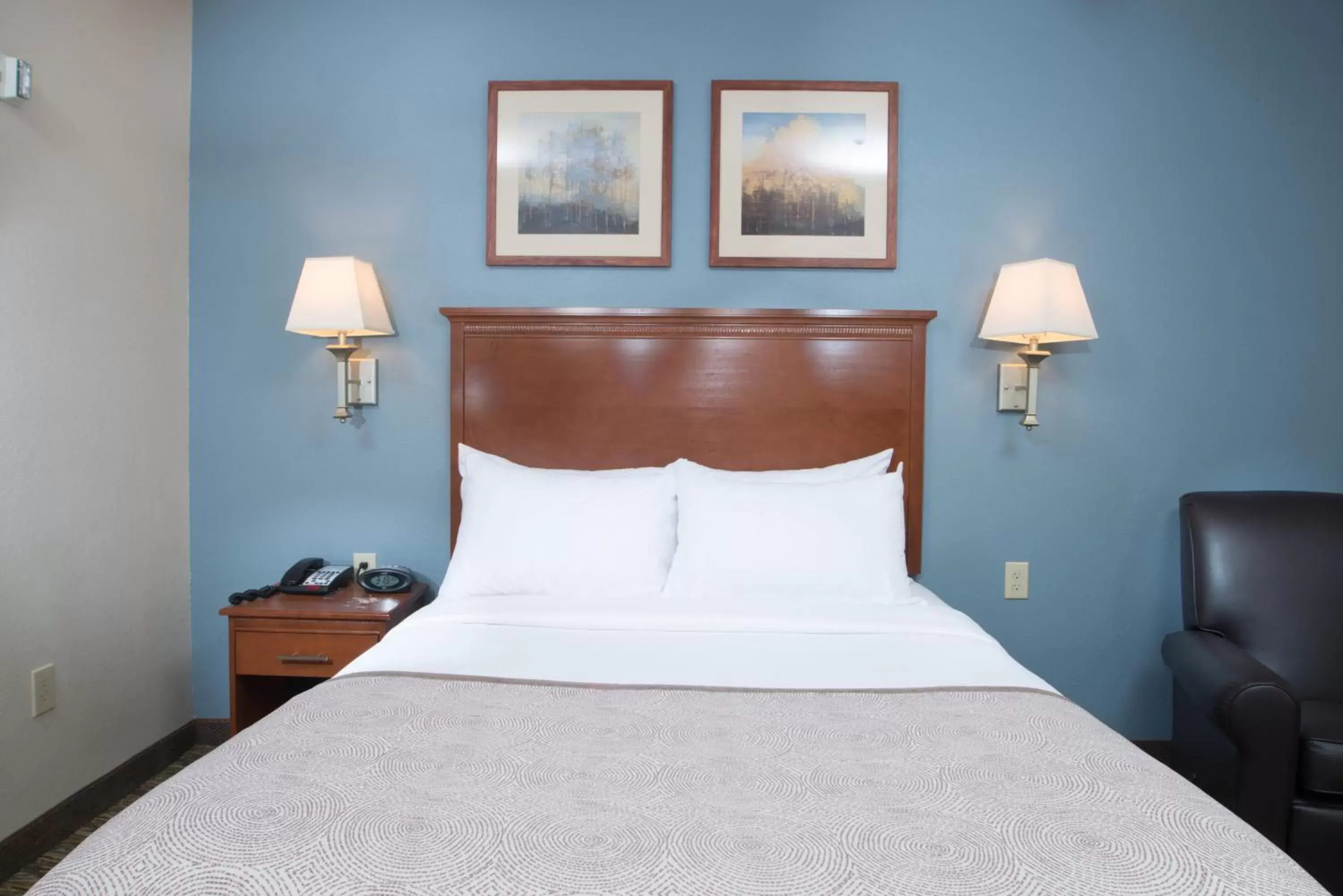 Bed in Candlewood Suites Wake Forest-Raleigh Area, an IHG Hotel