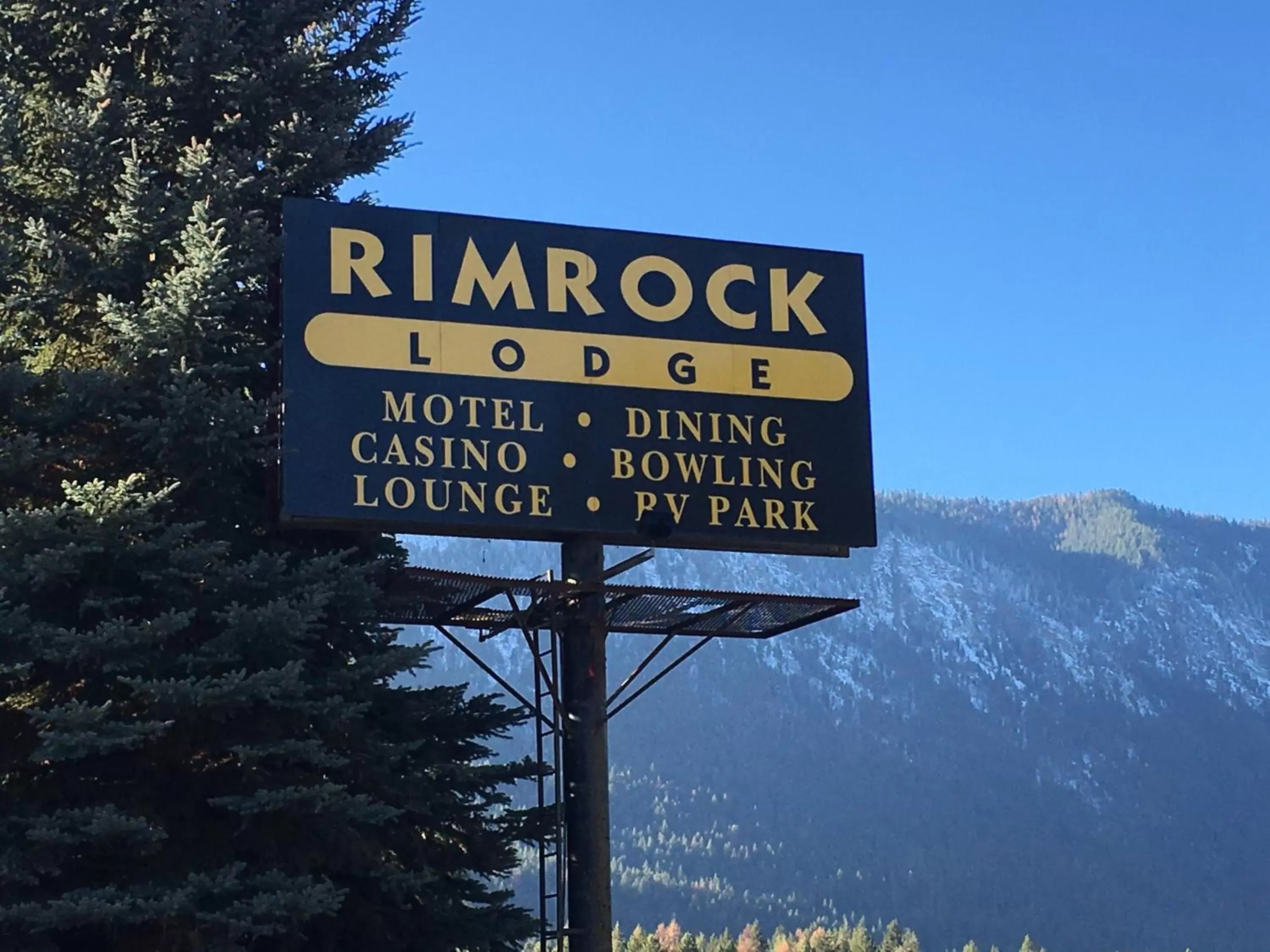 Property logo or sign in Rimrock Lodge LLC