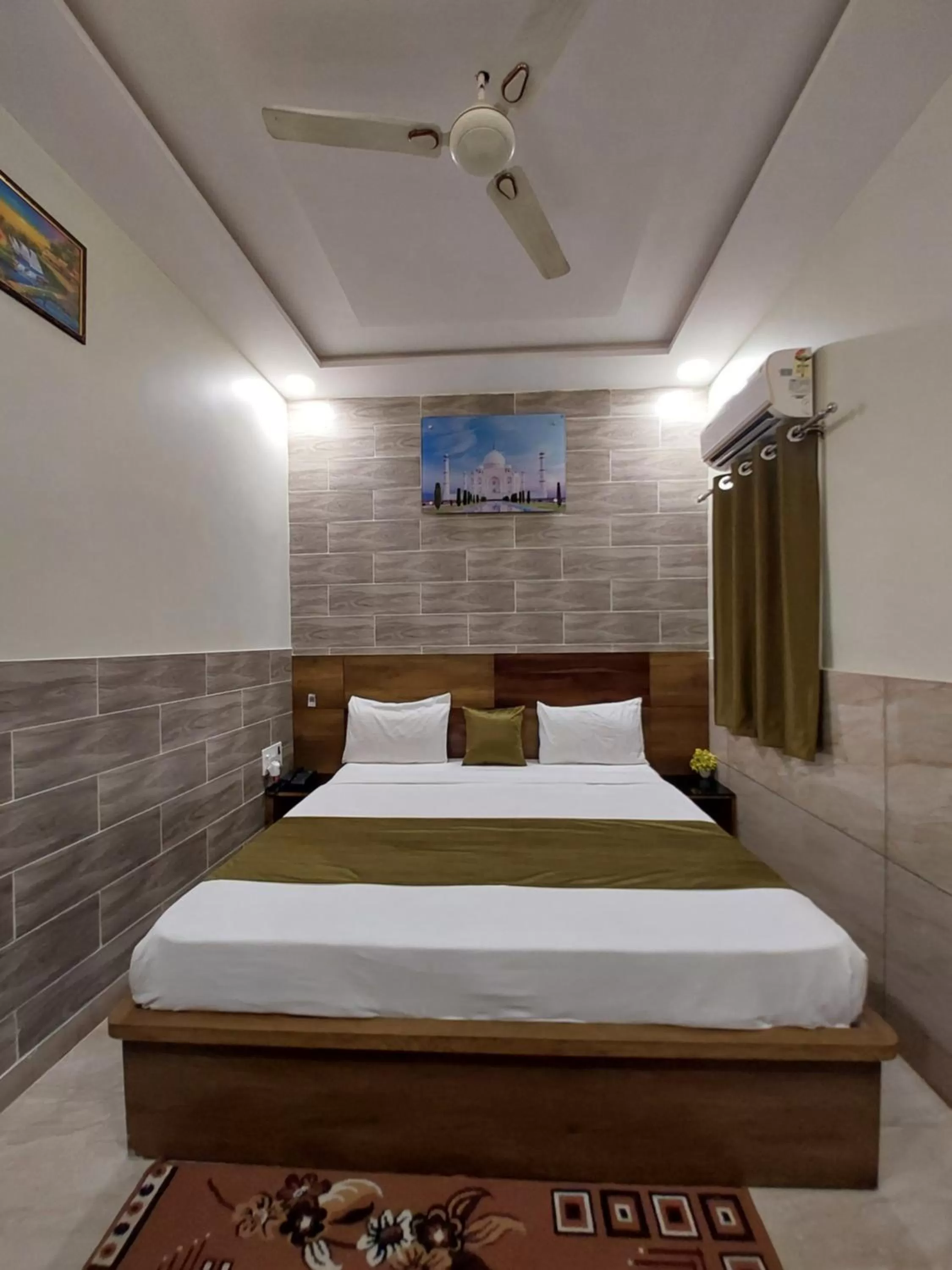 Bed in Taj Nice Point Manage by Taj Sunrise Group
