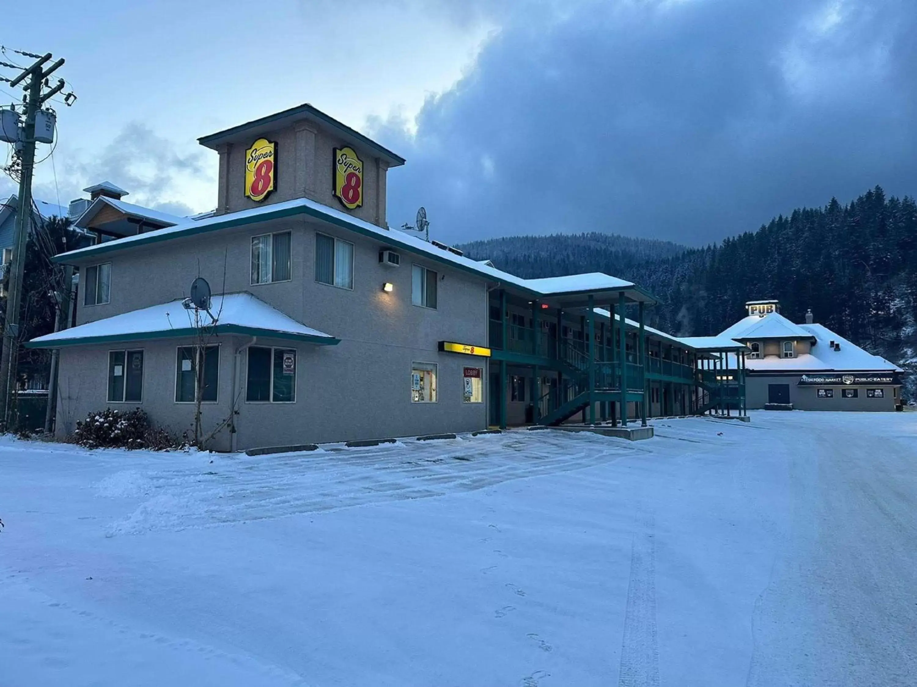 Property building, Winter in Super 8 by Wyndham Sicamous