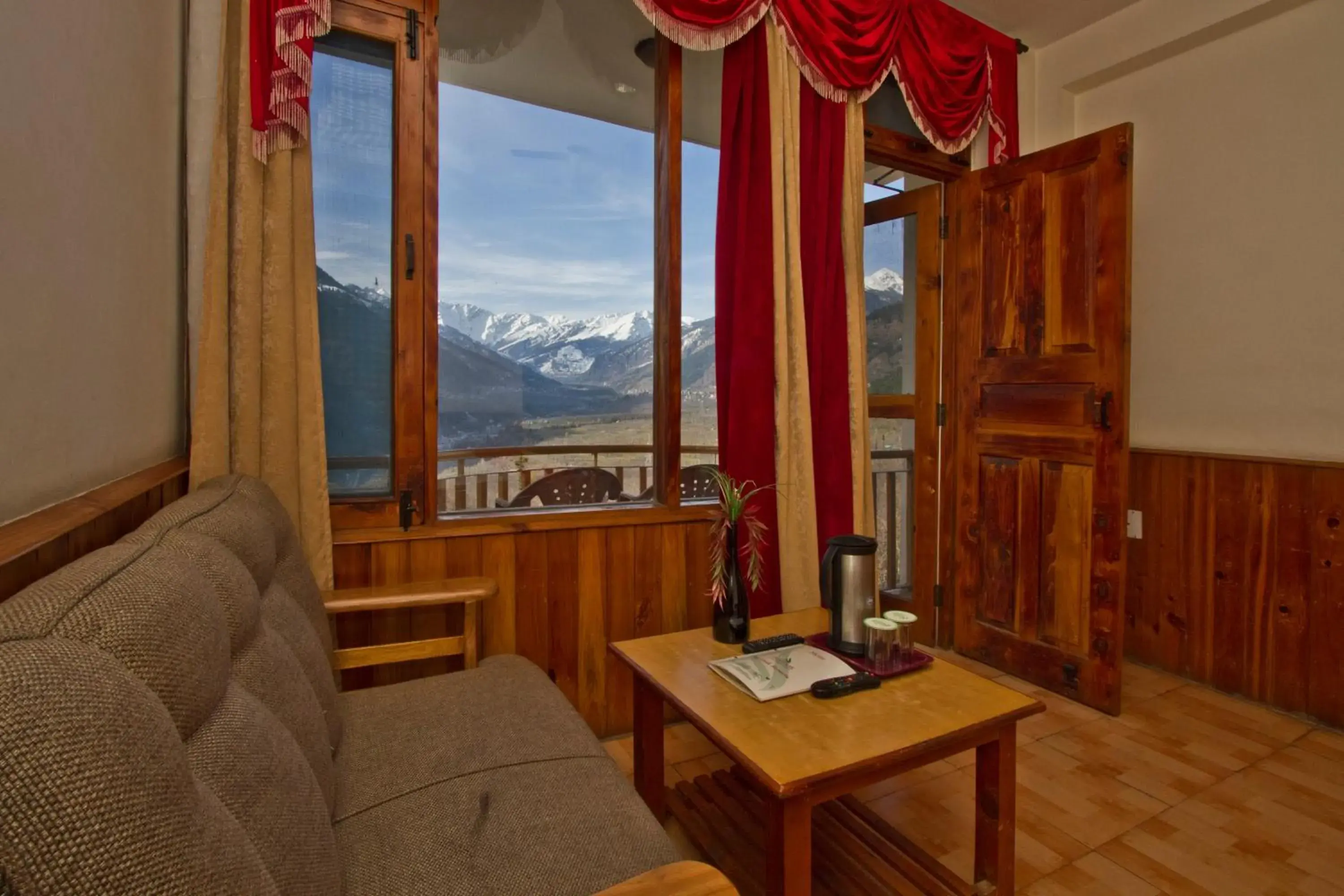 Seating Area in Sarthak Resorts-Reside in Nature with Best View, 9 kms from Mall Road Manali