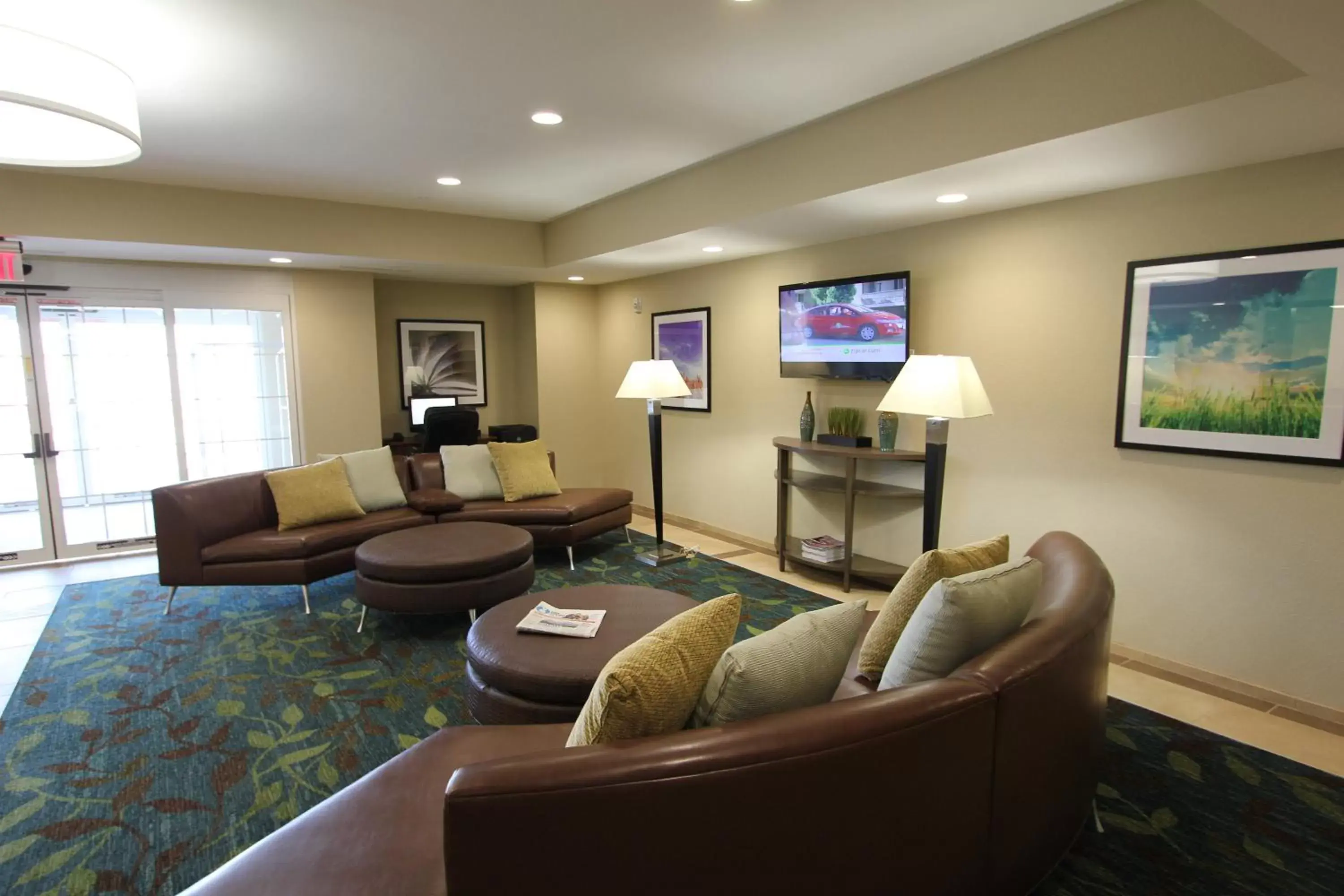 Property building, Seating Area in Candlewood Suites Greenville, an IHG Hotel