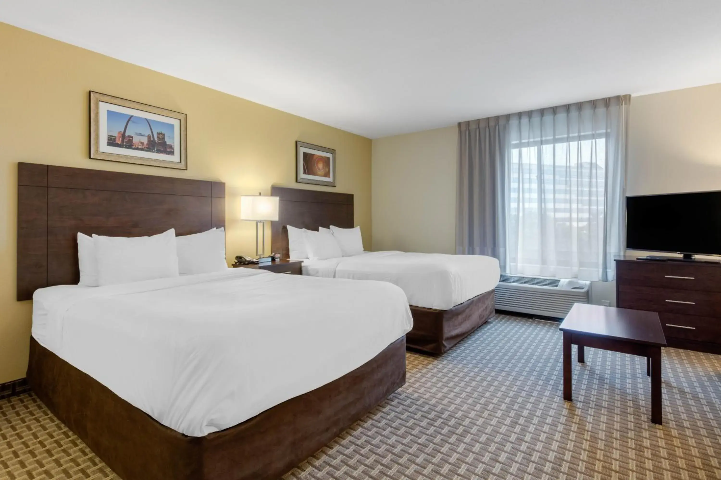 Photo of the whole room, Bed in MainStay Suites St. Louis - Airport