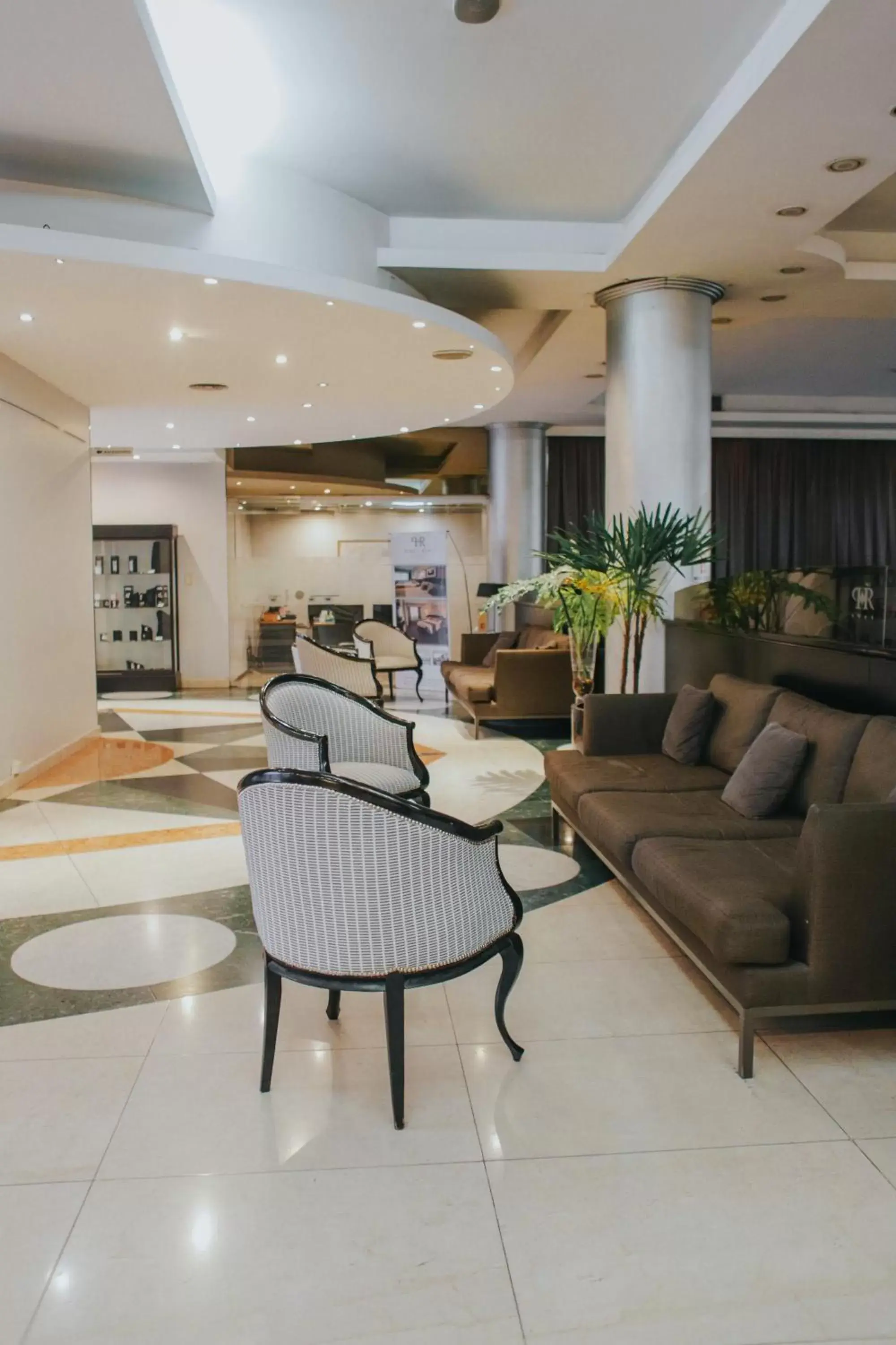 Seating area, Lobby/Reception in Plaza Real Suites Hotel