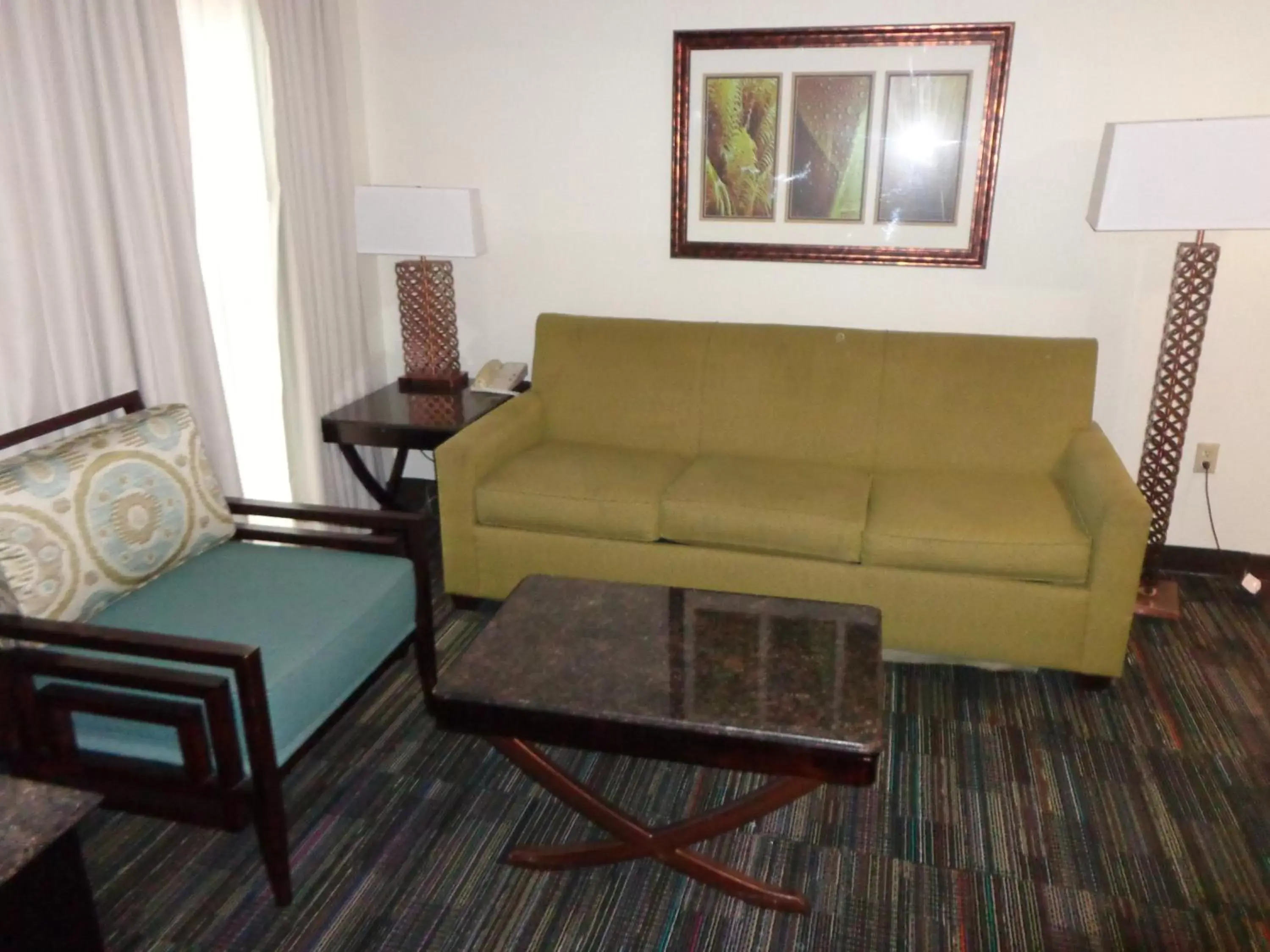 Living room, Seating Area in SureStay Plus by Best Western Orlando Lake Buena Vista