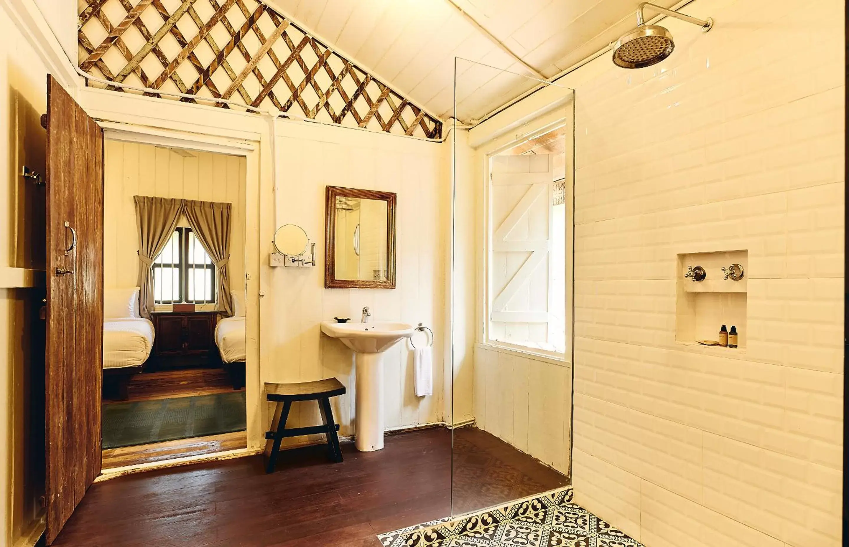 Bed, Bathroom in Temple Tree Resort