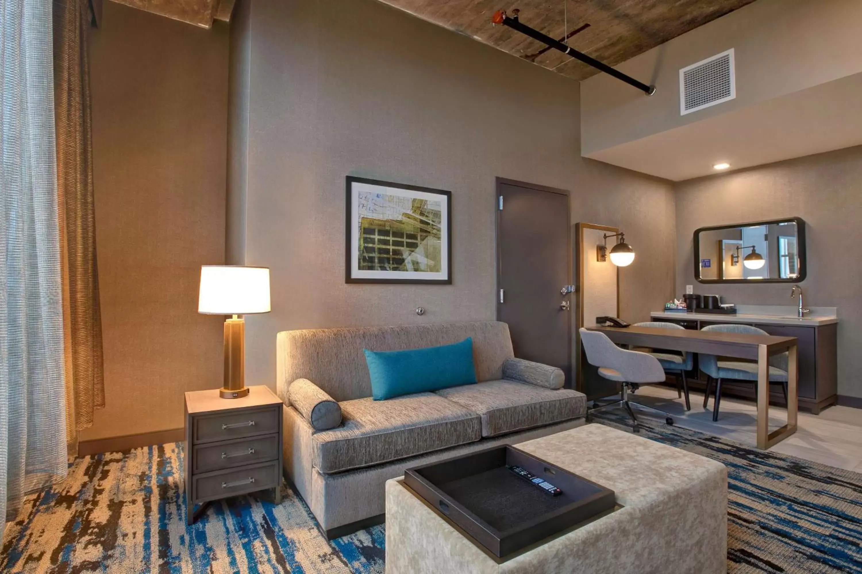 Living room, Seating Area in Embassy Suites By Hilton Rockford Riverfront