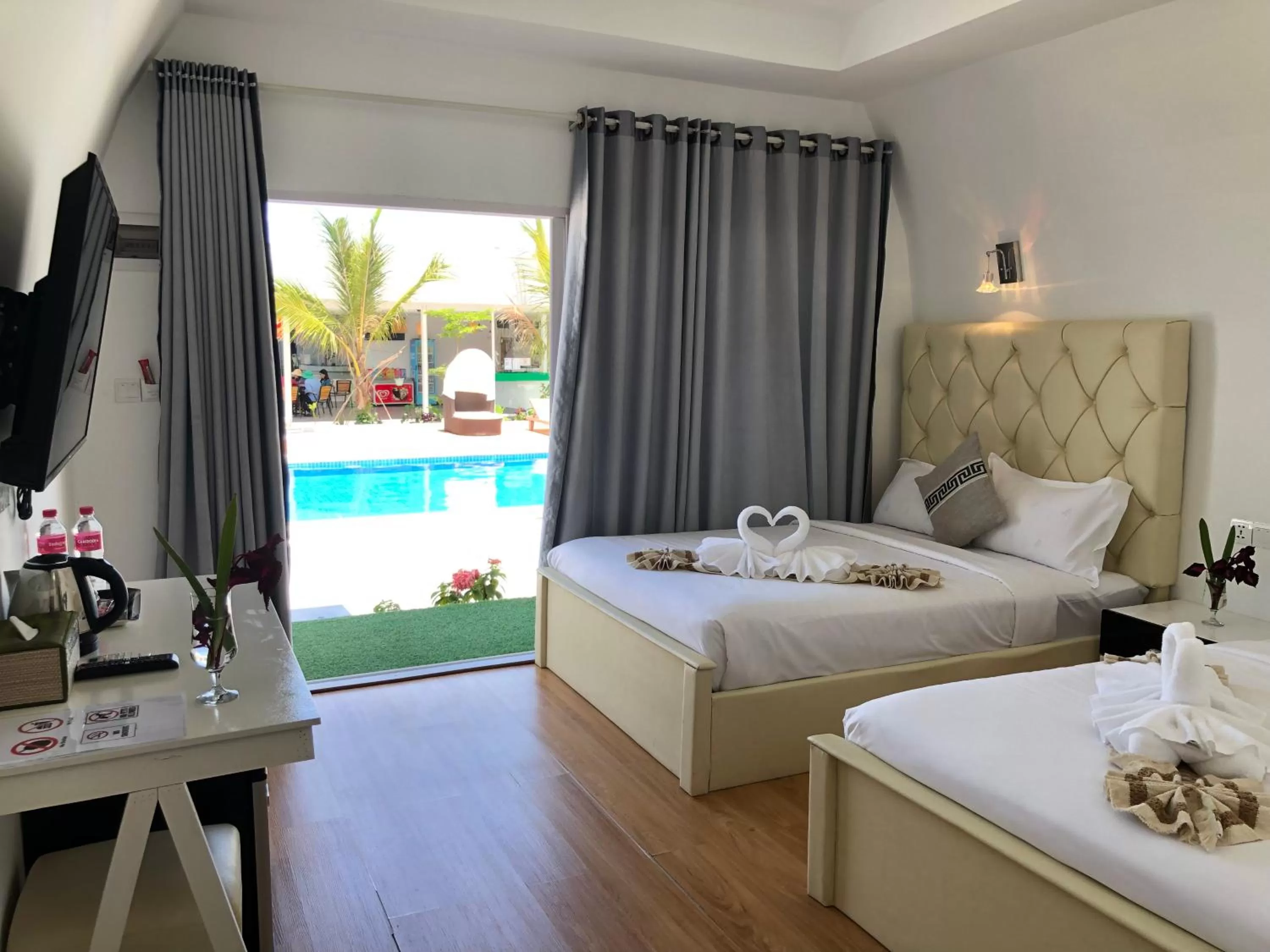 Photo of the whole room, Pool View in Jasmine River Front