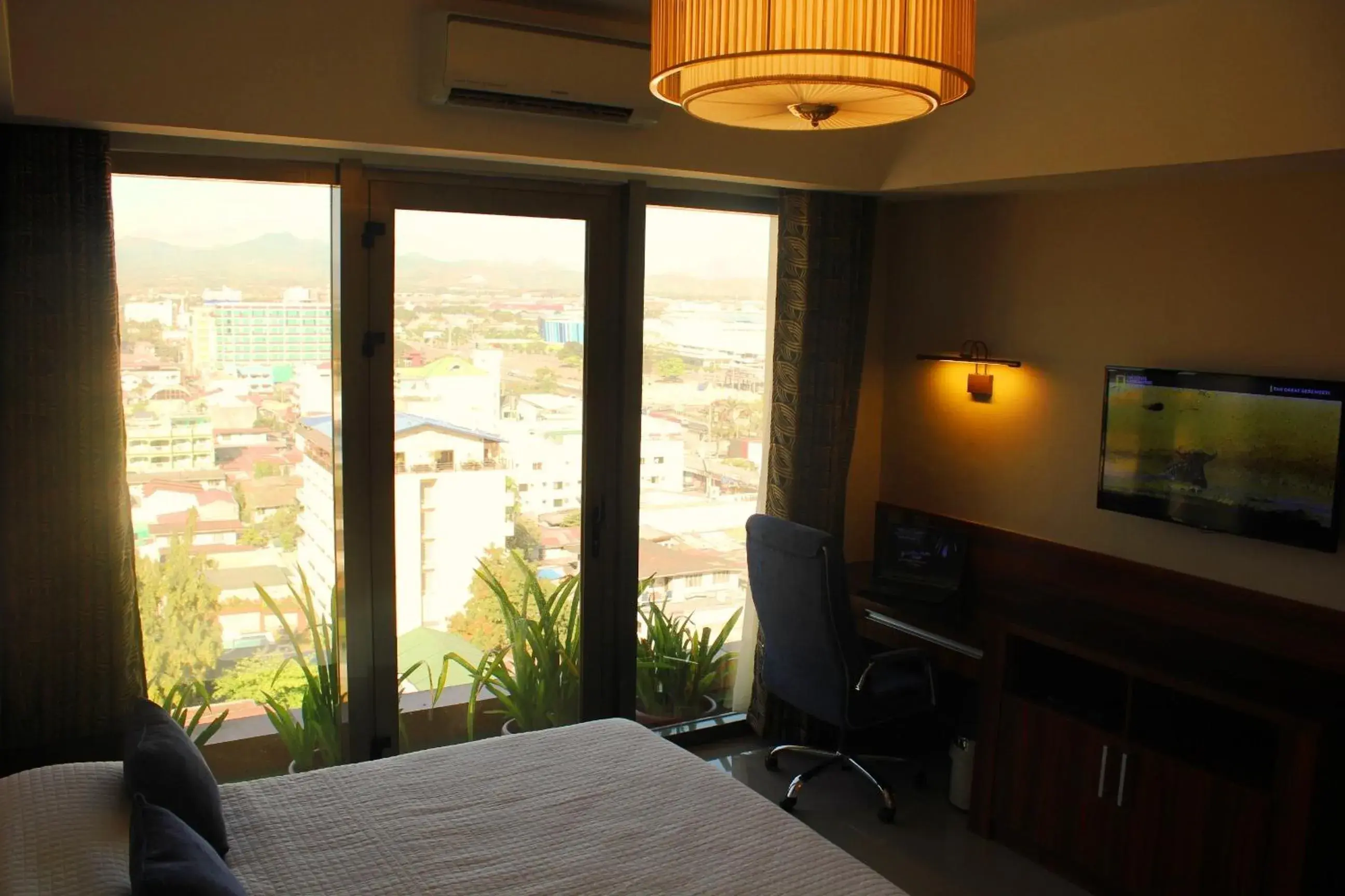 View (from property/room), Bed in Central Park Tower Resort View (from property/room), Bed in Central Park Tower Resort