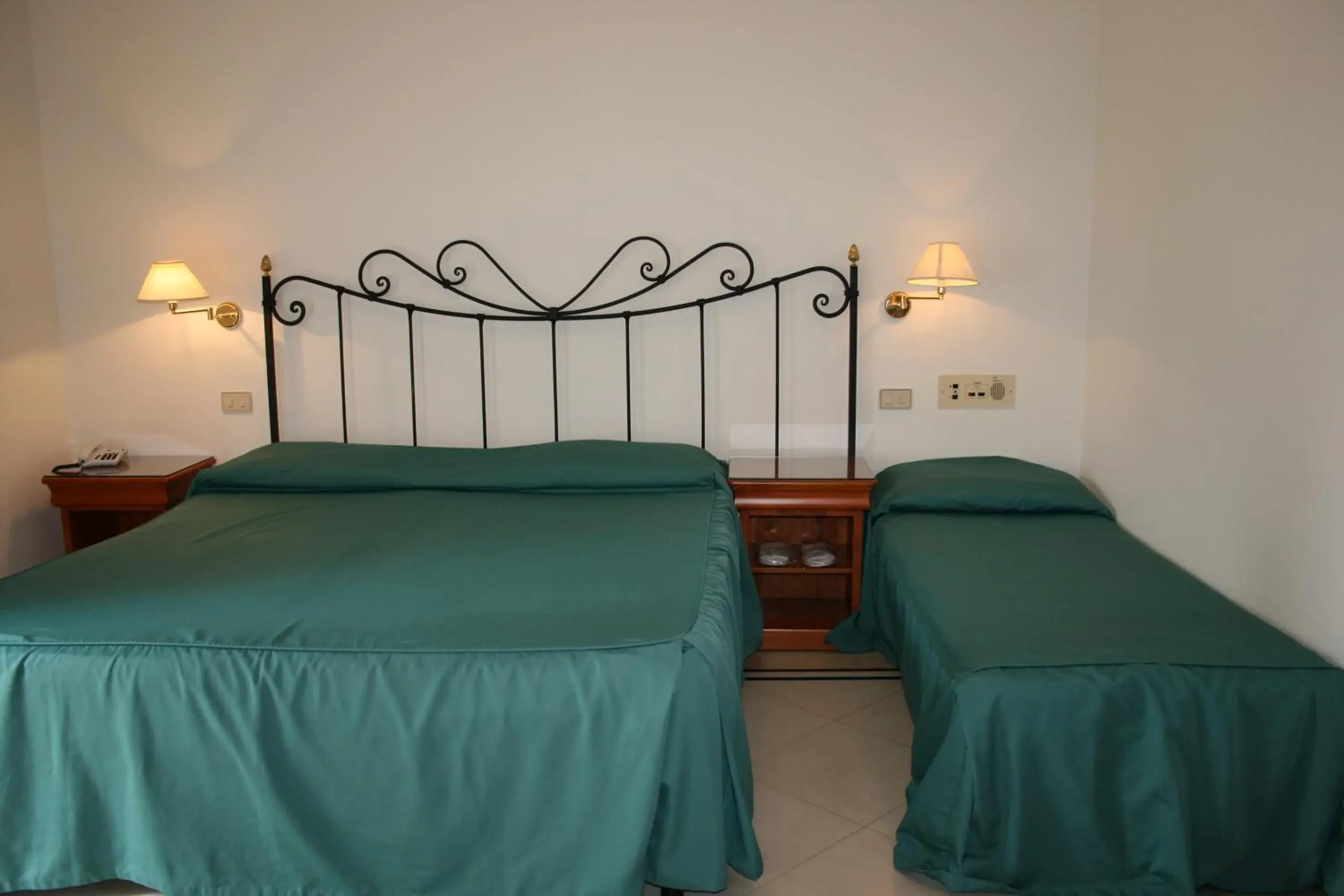 Bed in Villa Irlanda Grand Hotel