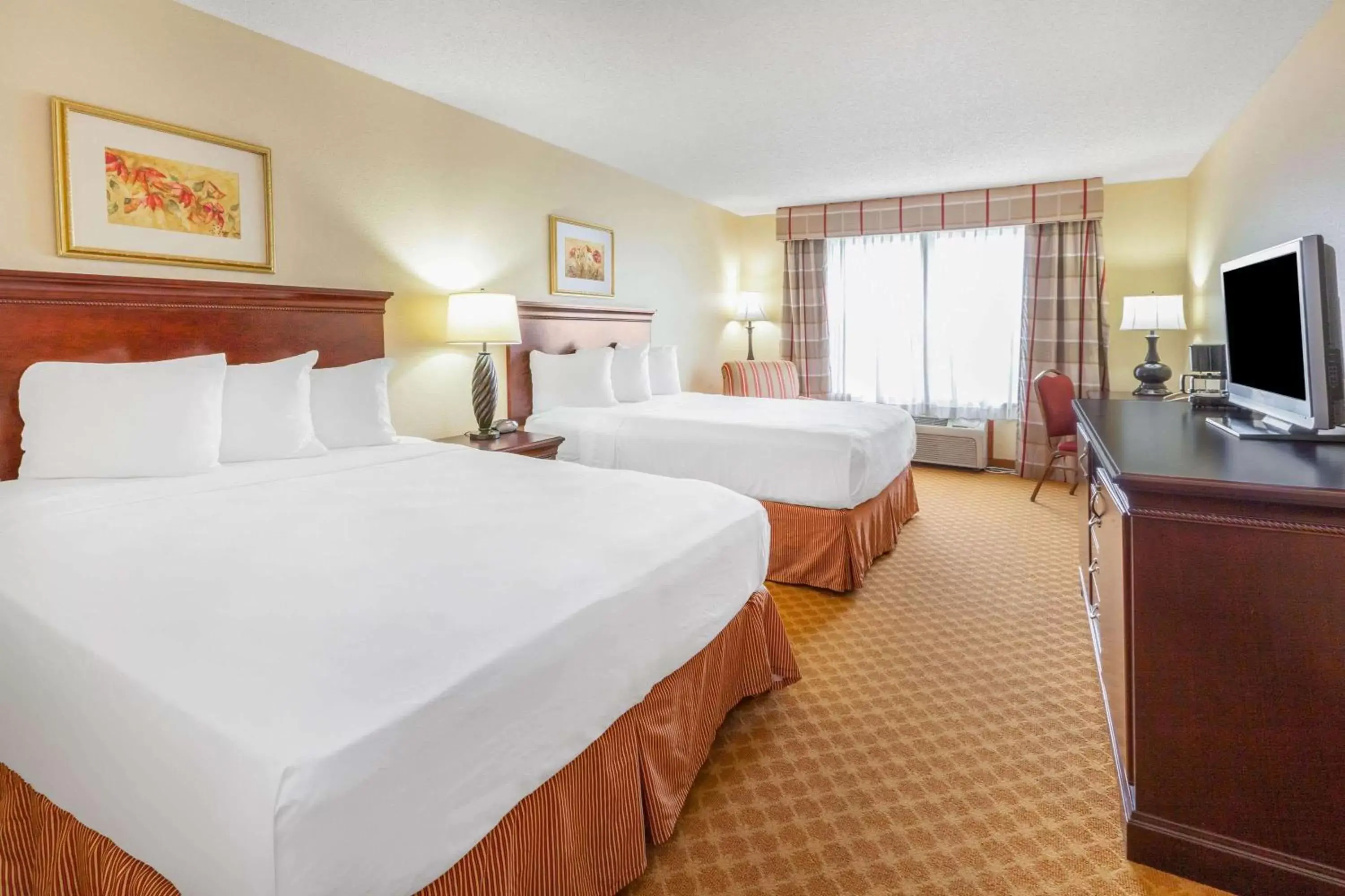 Photo of the whole room, Bed in AmericInn by Wyndham Iron Mountain